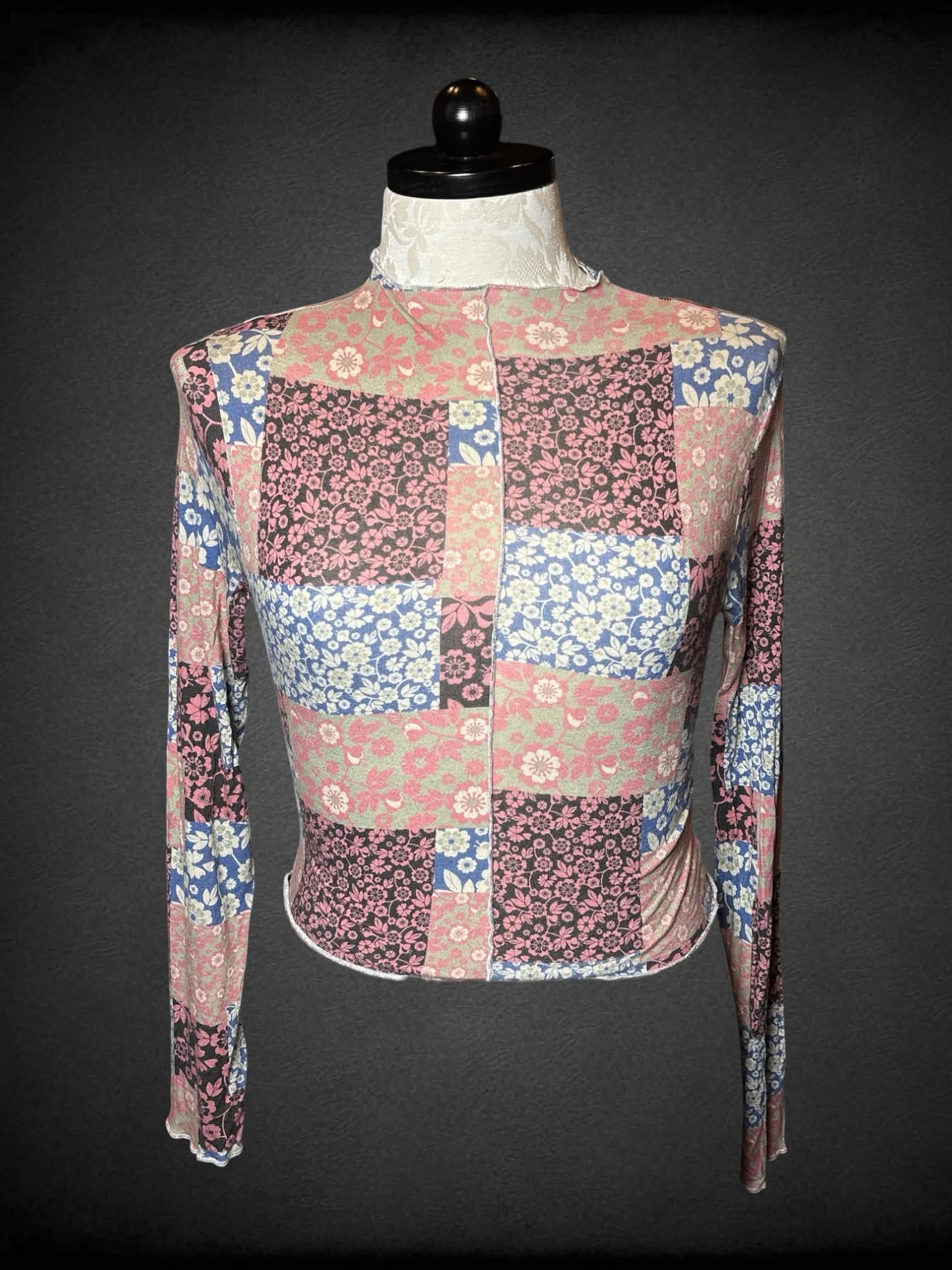 0X Twik long-sleeve soft baby tee with quilt-like floral design, and ruffle hem