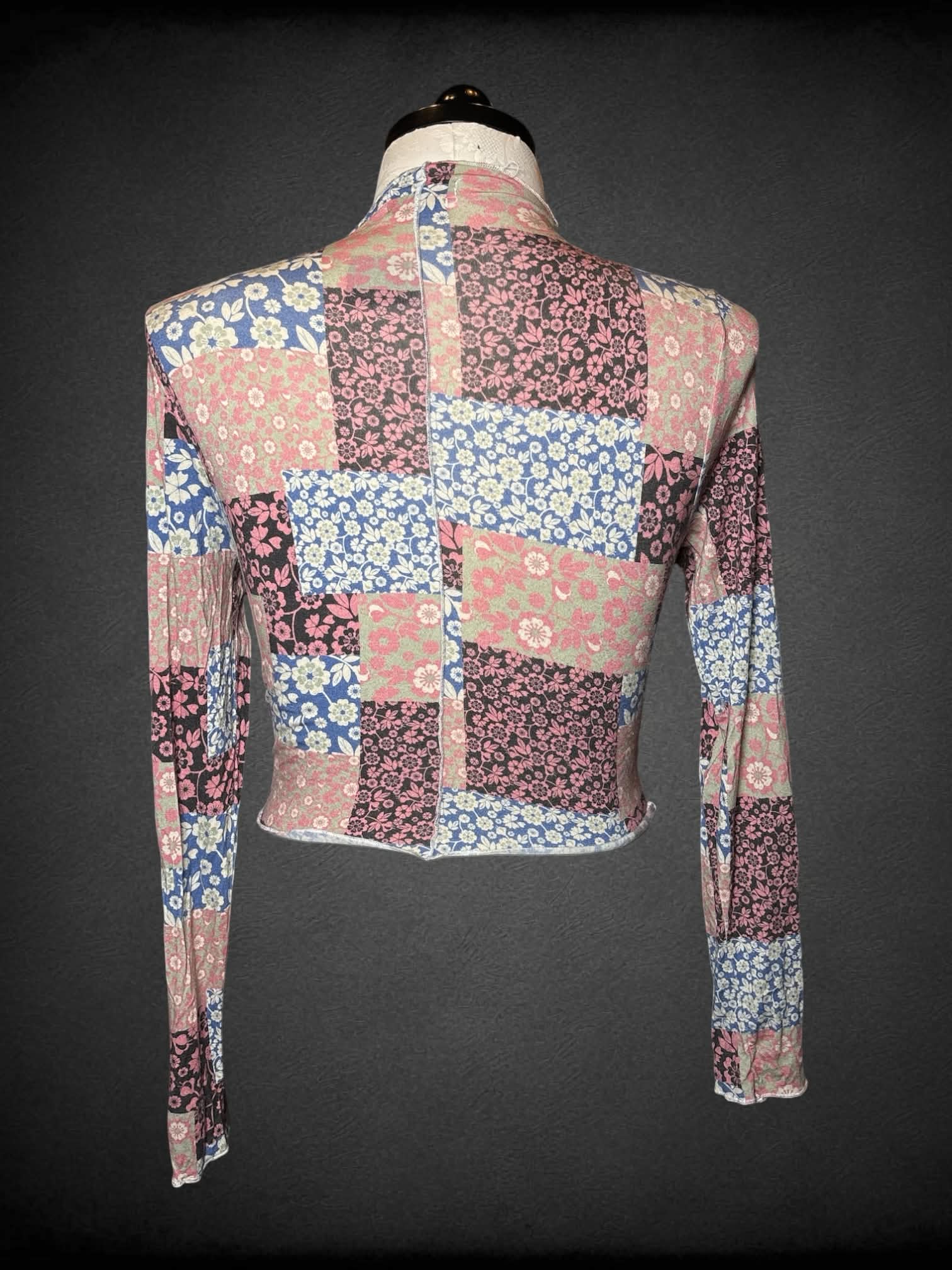 0X Twik long-sleeve soft baby tee with quilt-like floral design, and ruffle hem