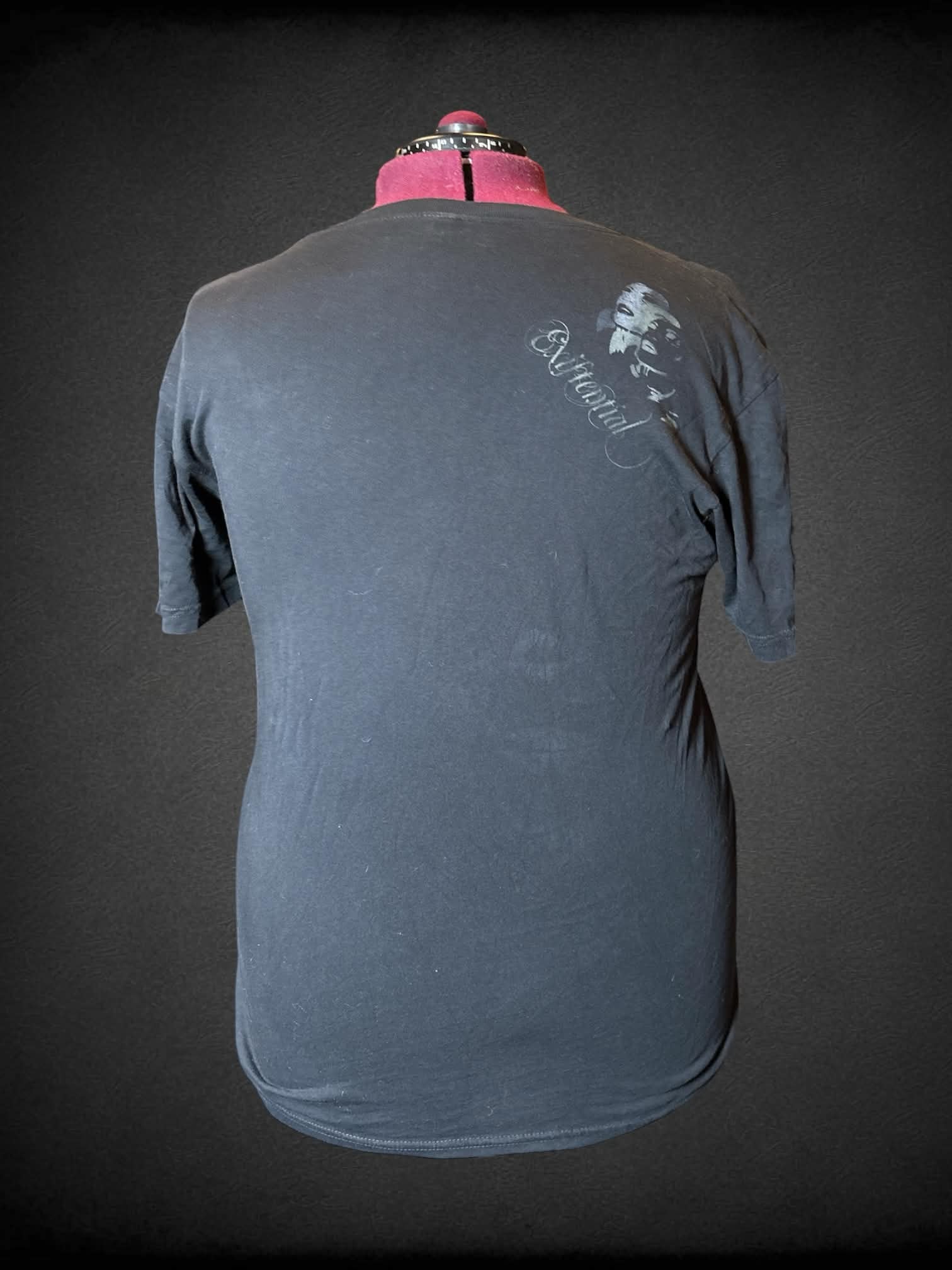 2X Existential black t shirt with cursive “Existential” writing on front & back, and abstract graphic