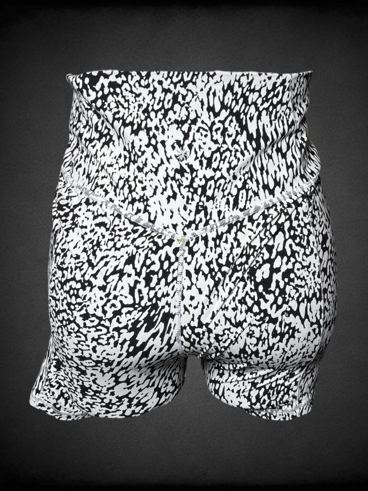 XL Athleta black & white athletic shorts with speckled pattern, and side pocket