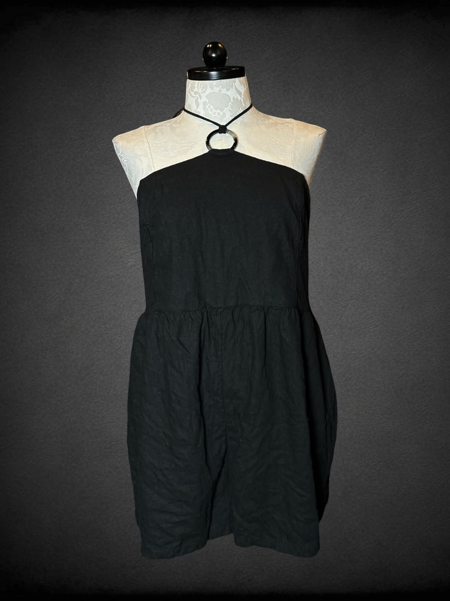 1X Old Navy black halter jumpsuit with adjustable tie neckline and hoop detailing on front