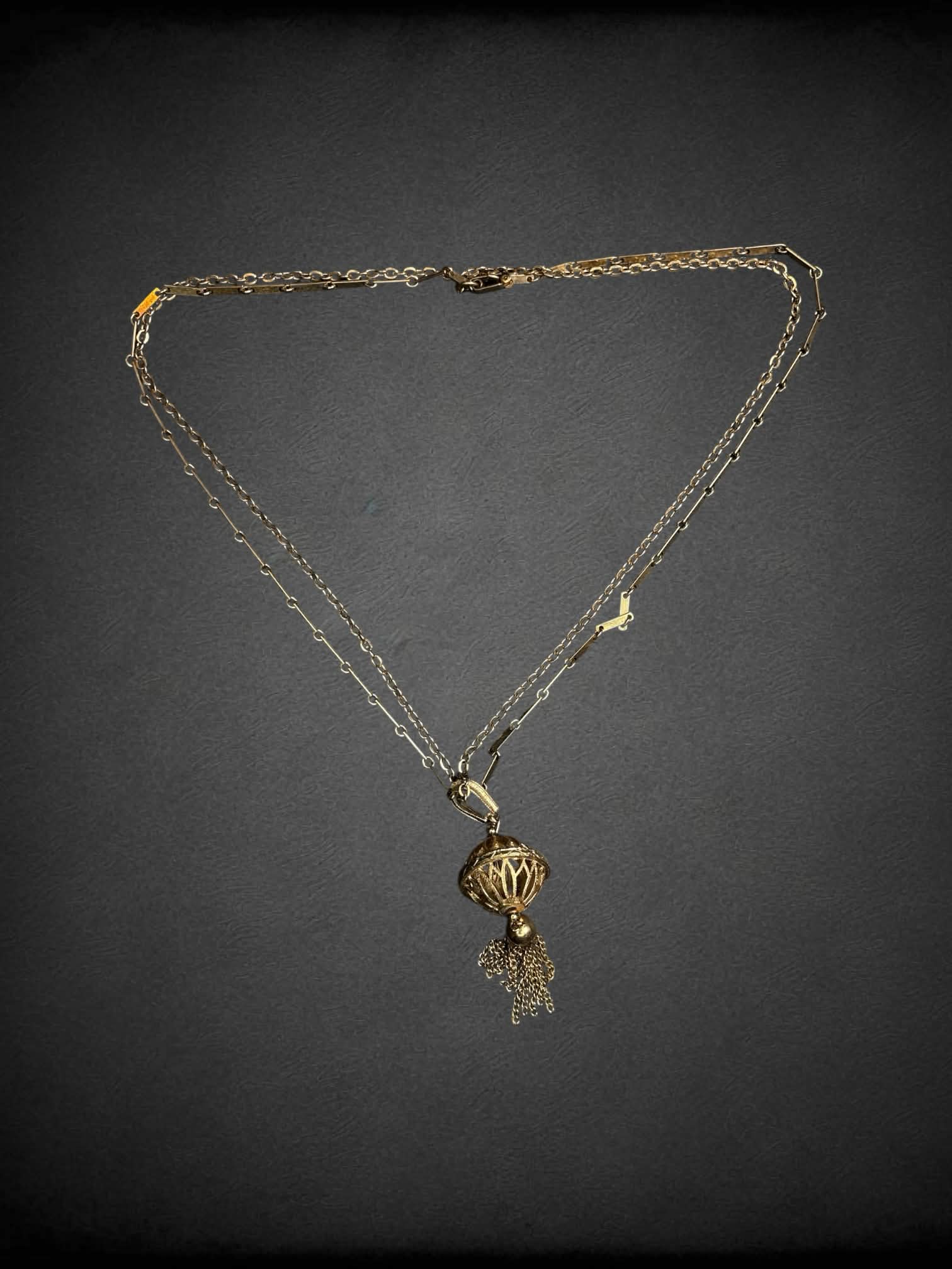 Vintage gold two-layered chain necklace with ornamental charm
