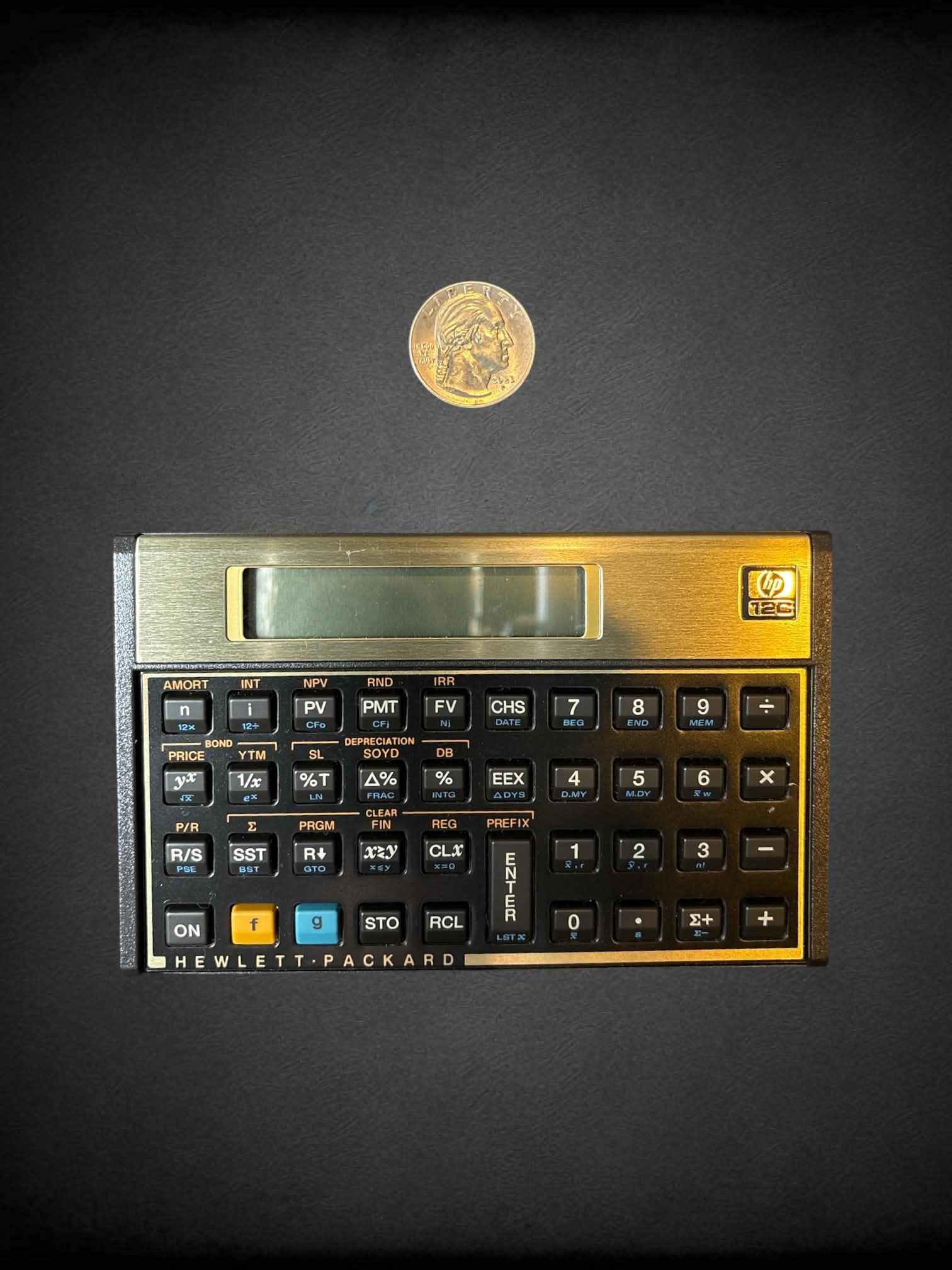 Vintage HP 12-C calculator & guidebook *needs new batteries*