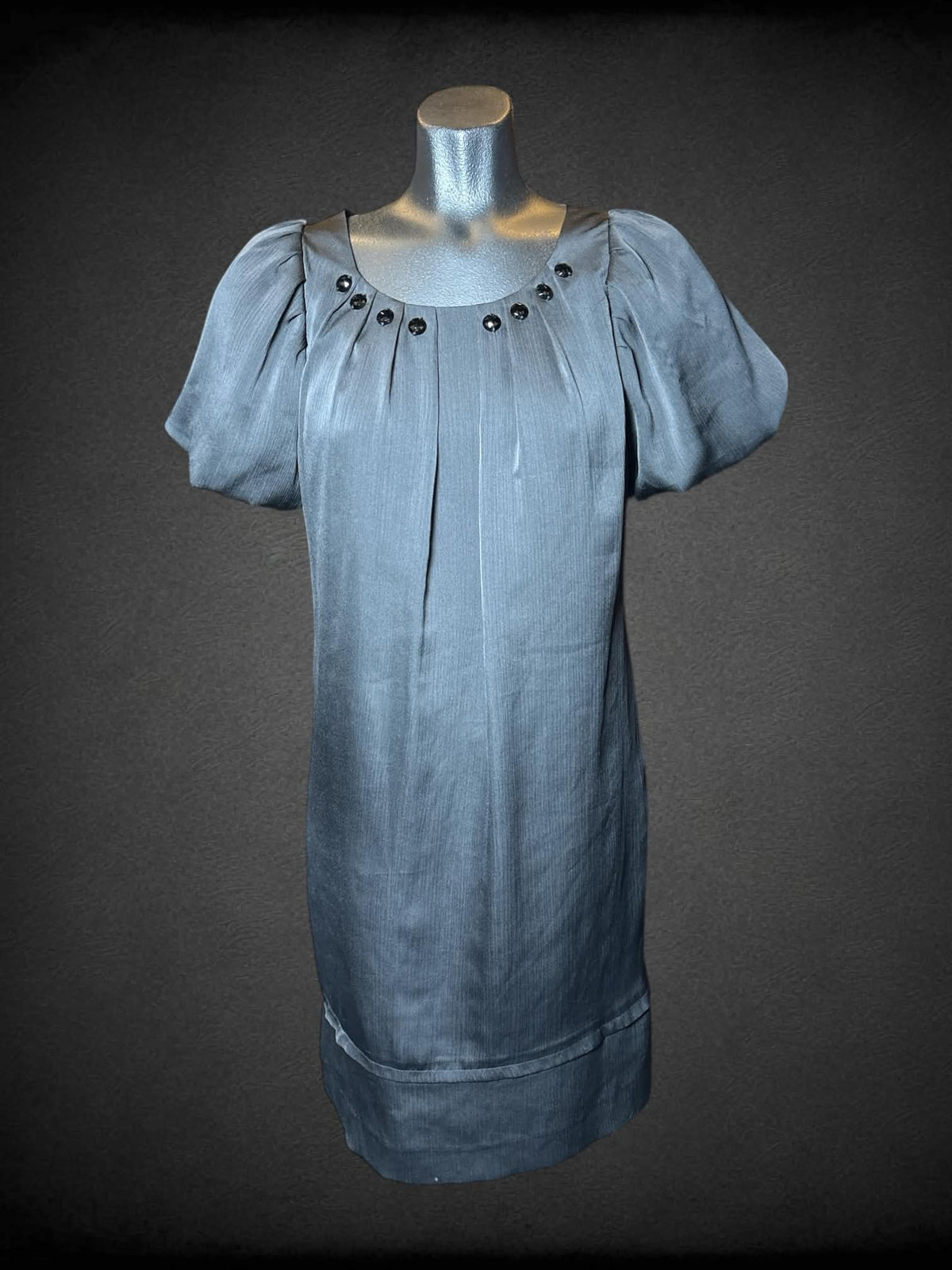 S Minimum black short dress with bubble sleeves, zipper on back, and black decorative buttons on neckline