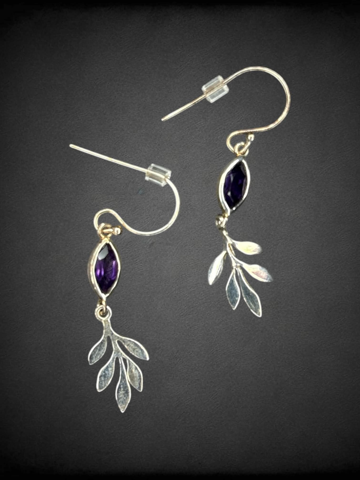 Silver leaf earrings with purple gemstone