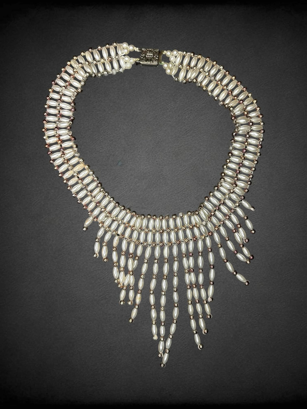 White beaded choker with dangling beads on front