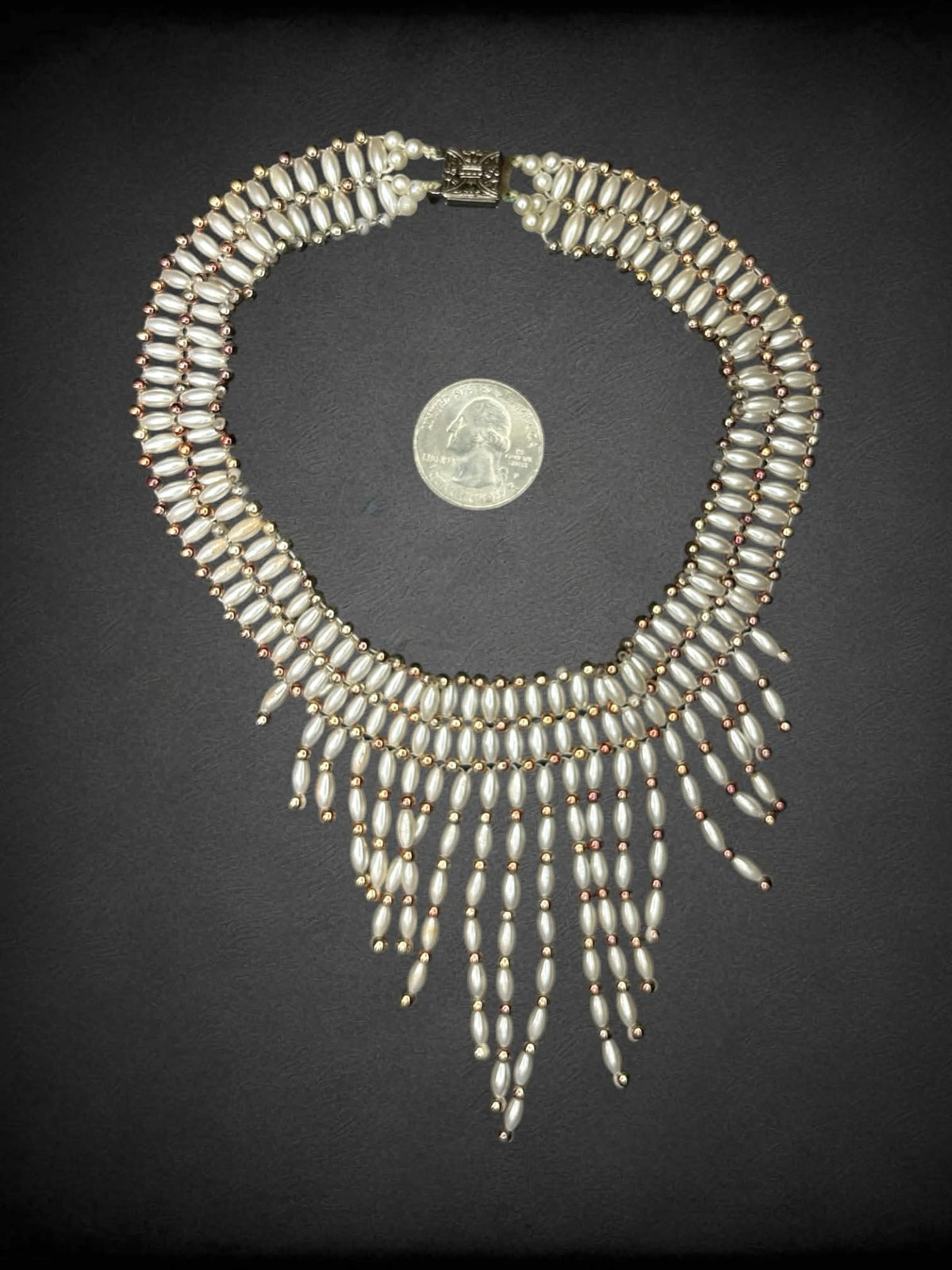 White beaded choker with dangling beads on front