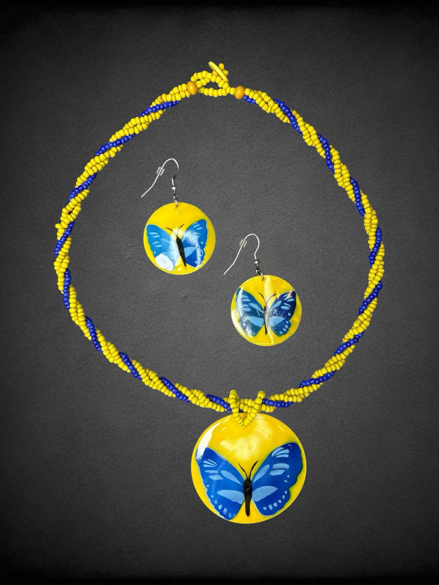Two-piece blue & yellow jewelry set with butterfly earrings, and beaded butterfly necklace