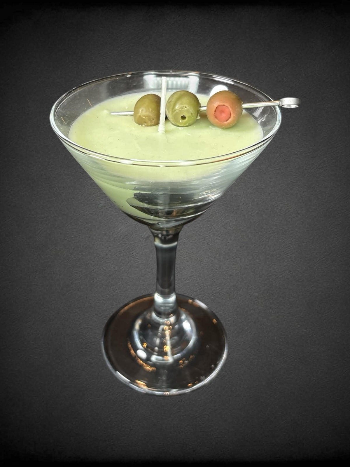 Lime-scented Martini candle in martini glass with wax olives