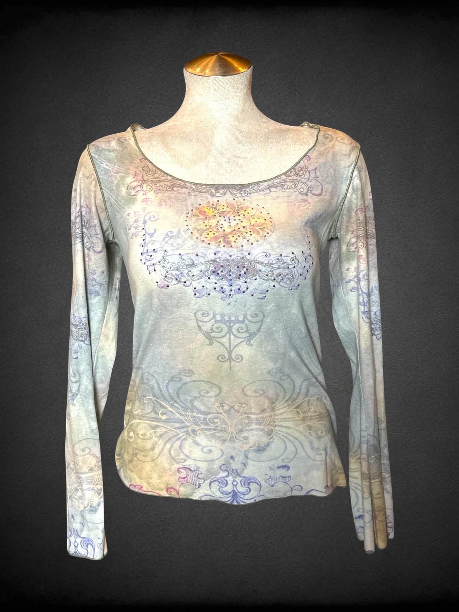 L One World pale green long-sleeve shirt with vector flourish and gemstone design