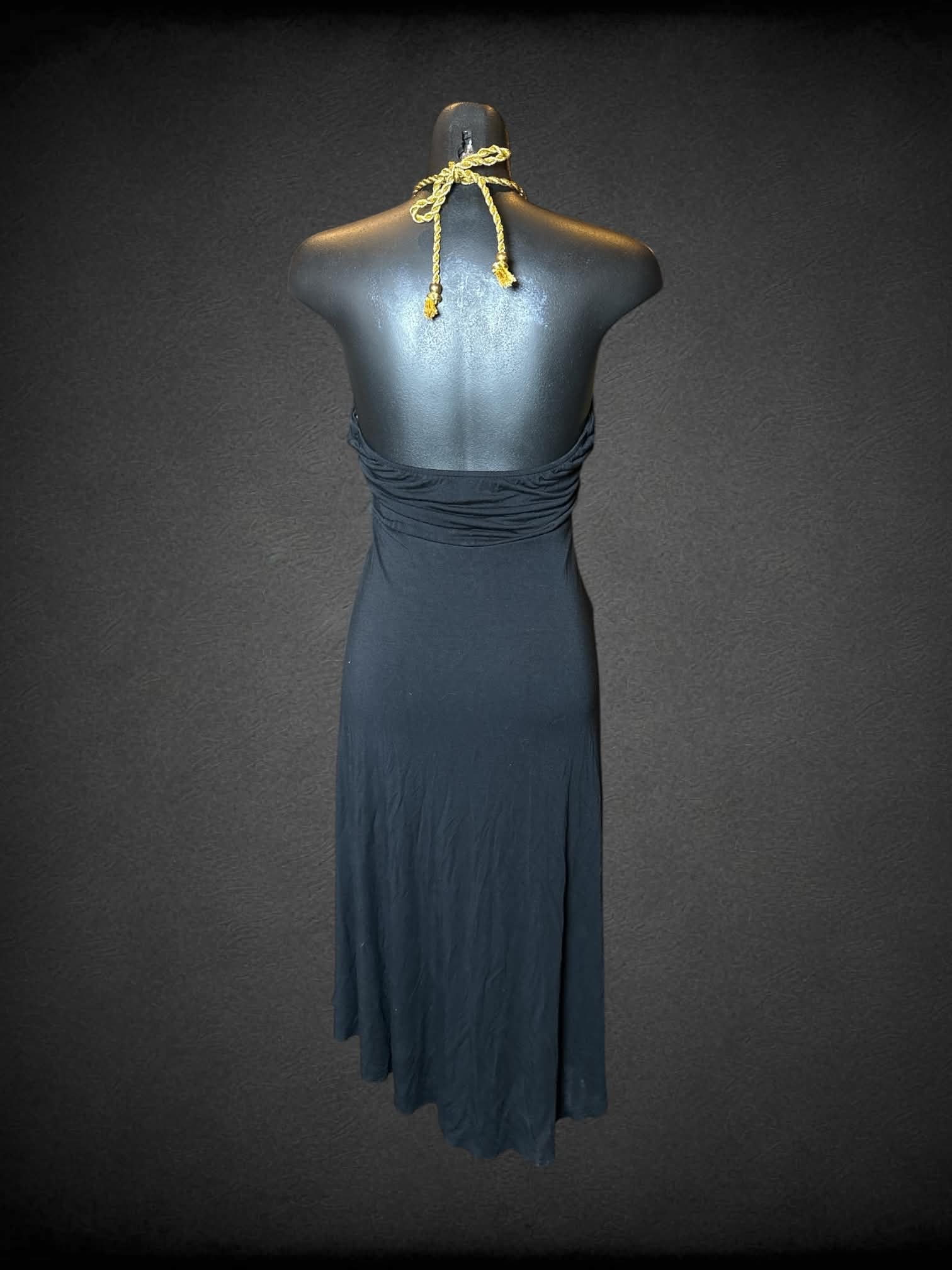M Sweetees black halter dress with gold rope straps, and asymmetrical layered design