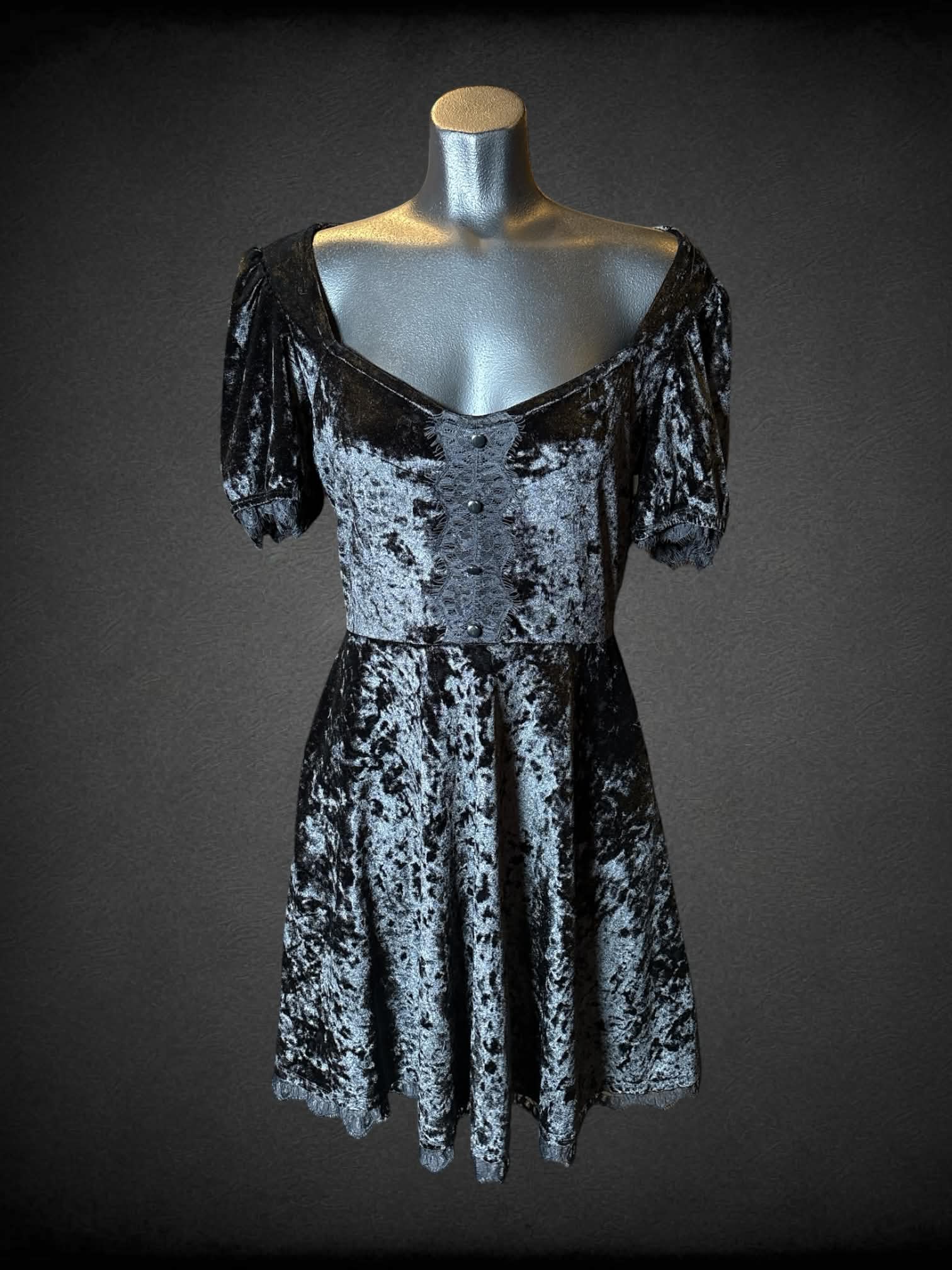 M Cosmic Aura black crushed velvet-like short dress with pockets, and decorative lace and buttons on front