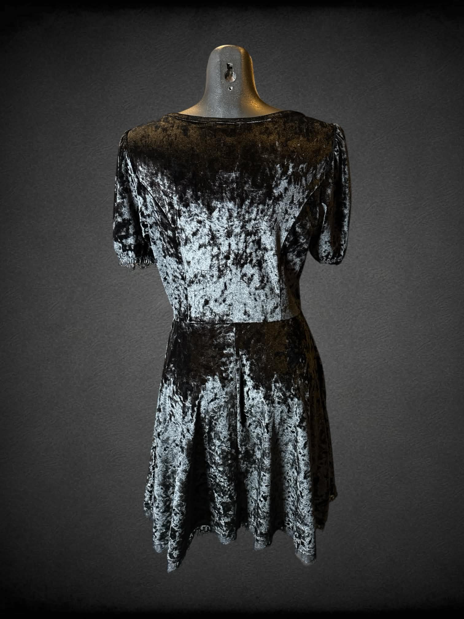 M Cosmic Aura black crushed velvet-like short dress with pockets, and decorative lace and buttons on front