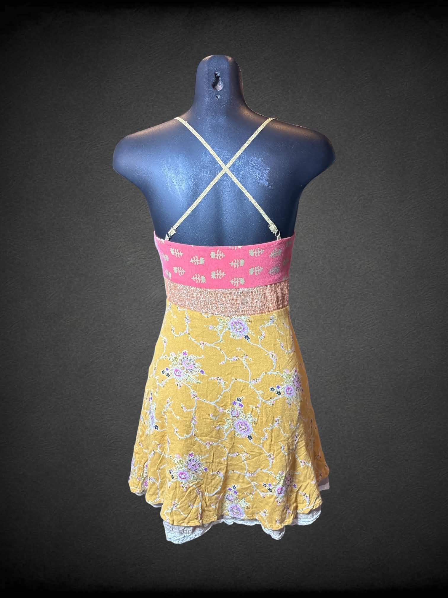 XS Free People yellow & pink short dress with floral pattern, metallic detailing on waist, and zipper on side