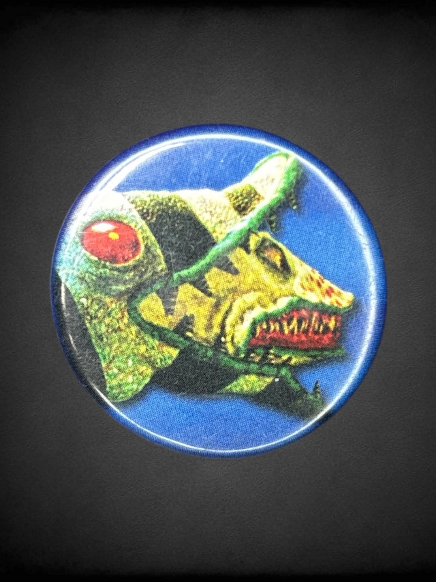 Blue button “BeetleJuice” eel pin