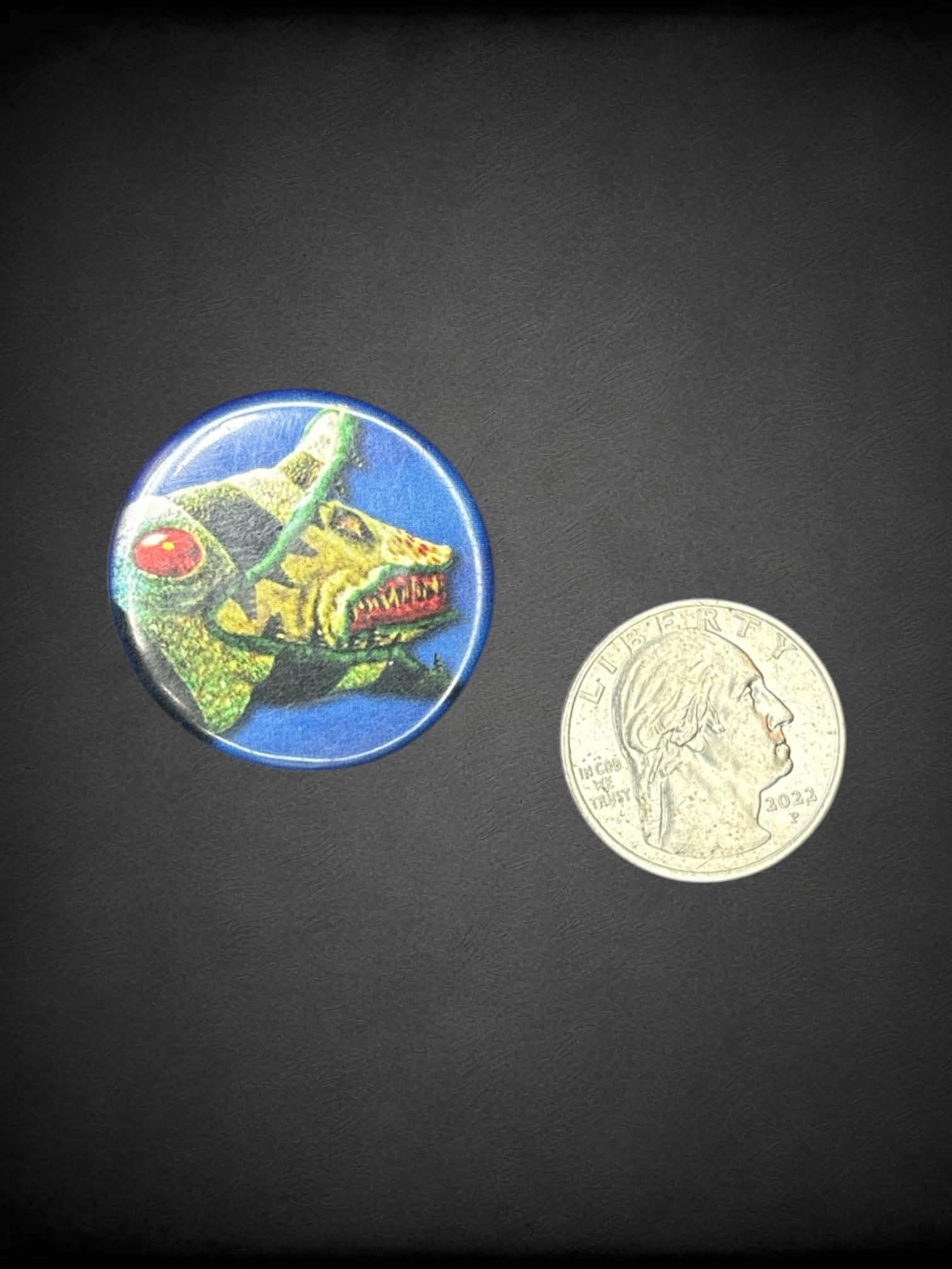Blue button “BeetleJuice” eel pin