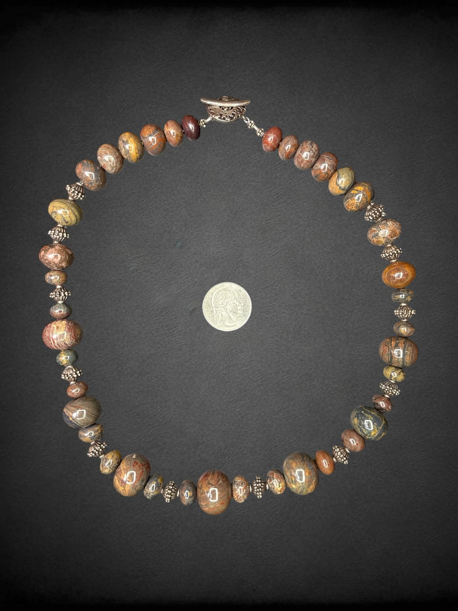 Marble beaded necklace with metallic charm clasp