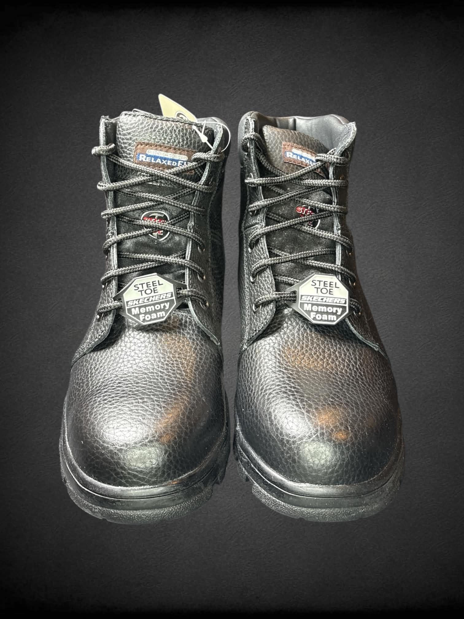 Size 11 Sketchers new in box steel toe relaxed fit black boots, with memory foam