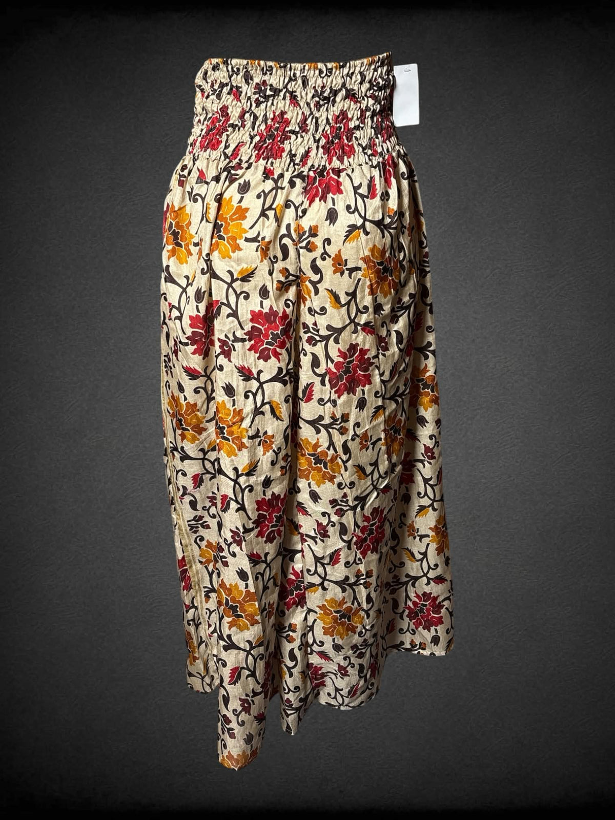 L Darn Good NWT tan high-waisted pants with floral design