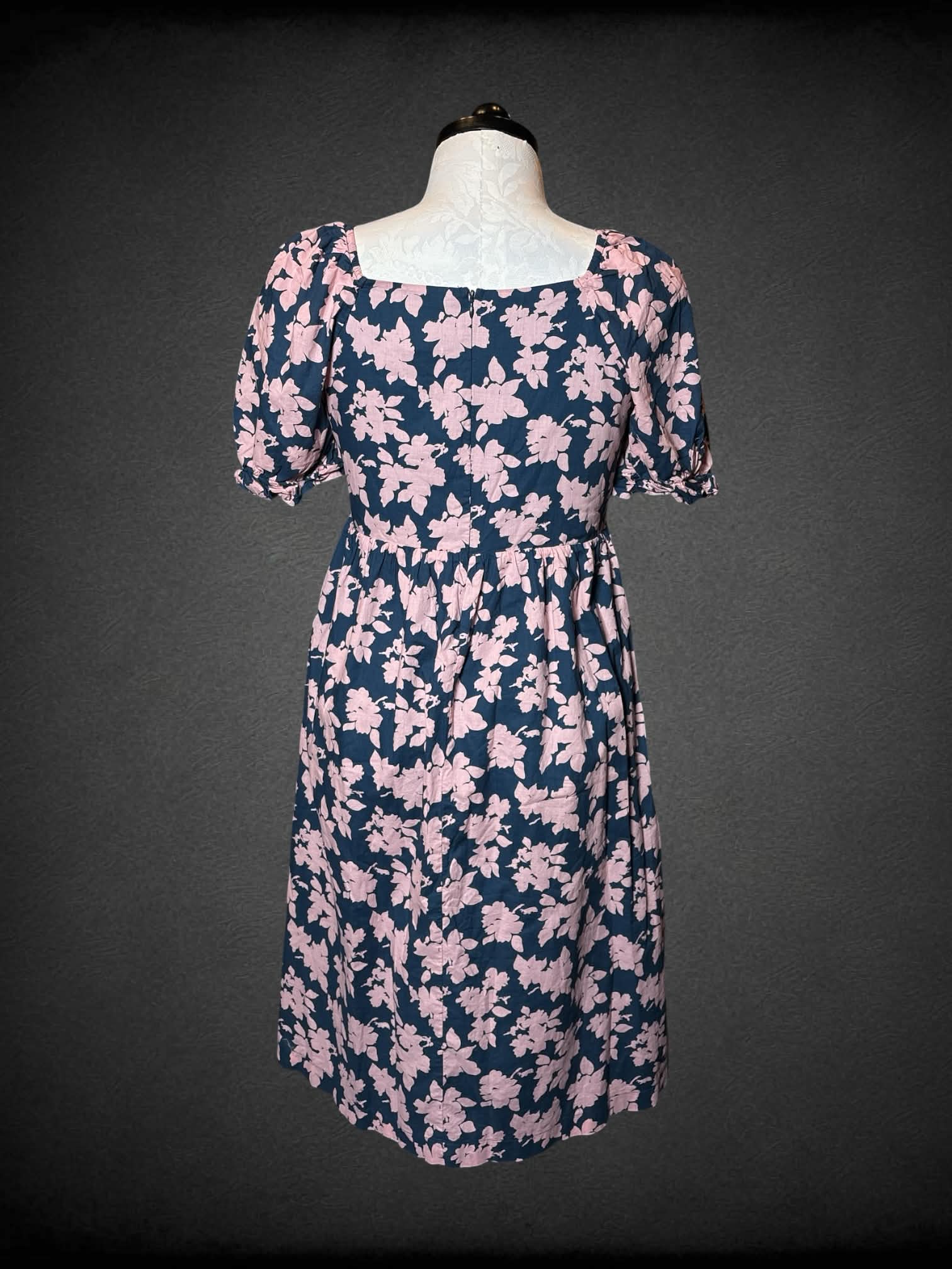 XL Hatch navy blue dress with pink floral pattern, shirred top, and zipper on back