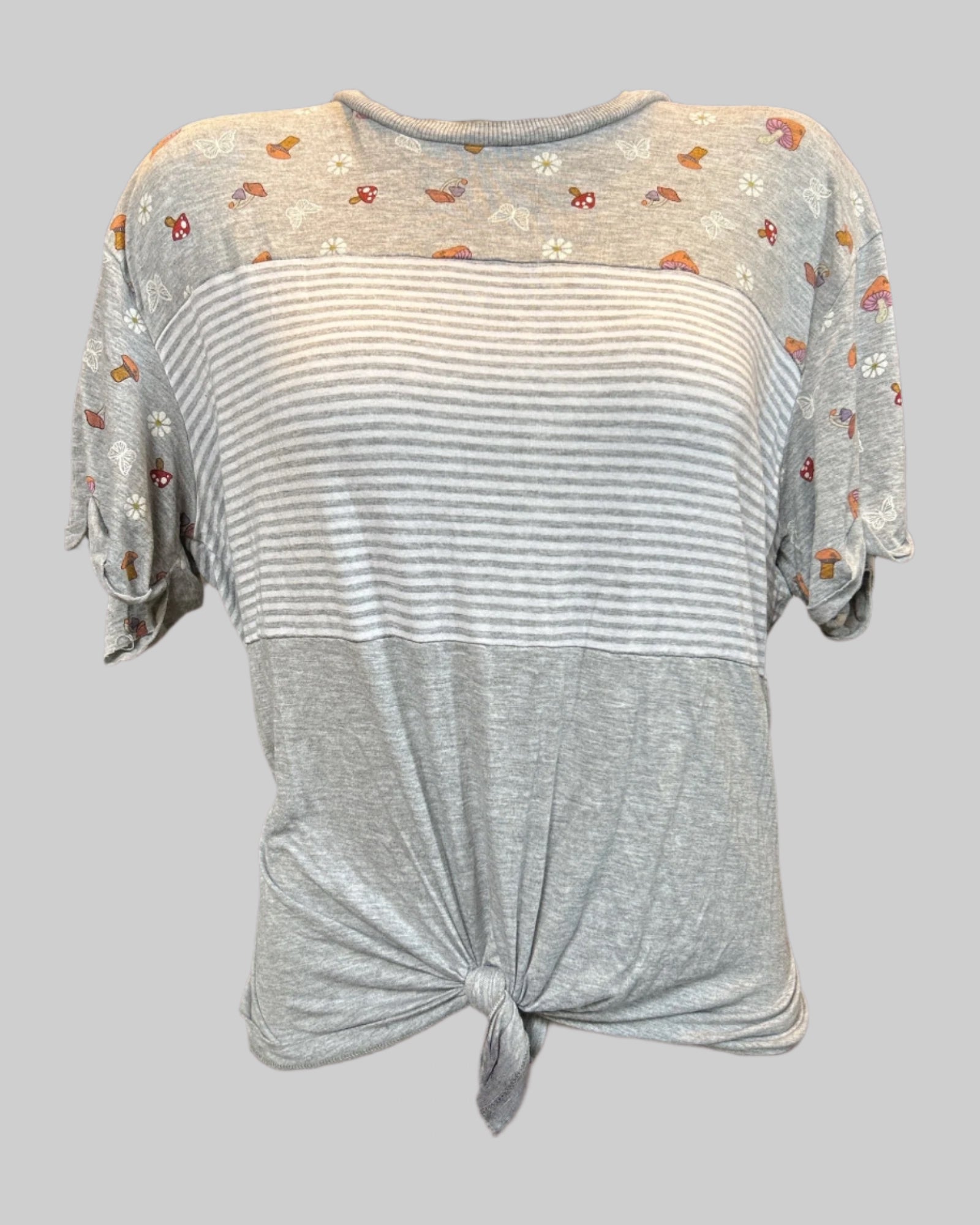 2x flowy and stretchy gray color block t shirt with mushroom, butterfly, floral designs, and a tie in front