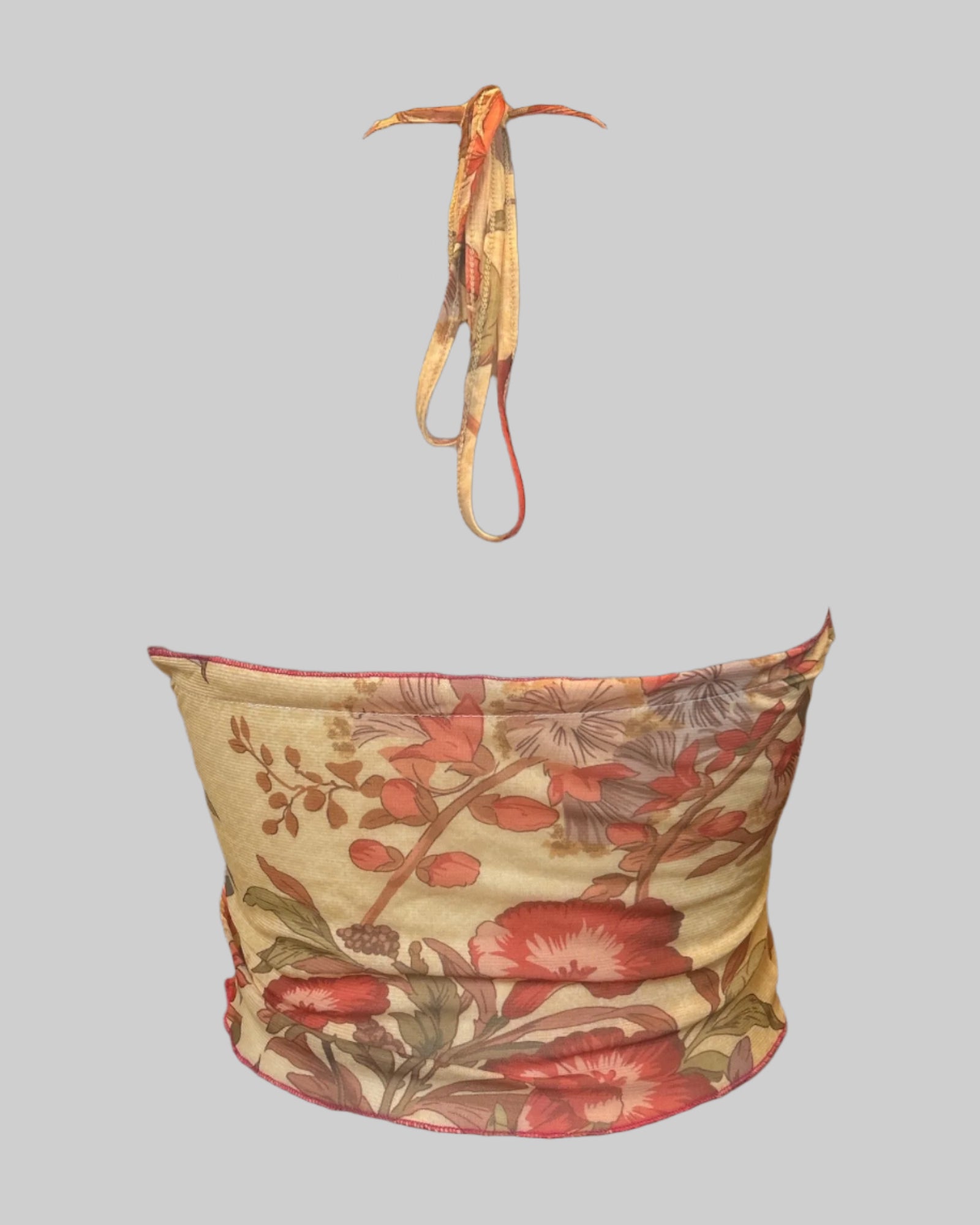 XS yellowish sheer halter top with florals and lettuce hem