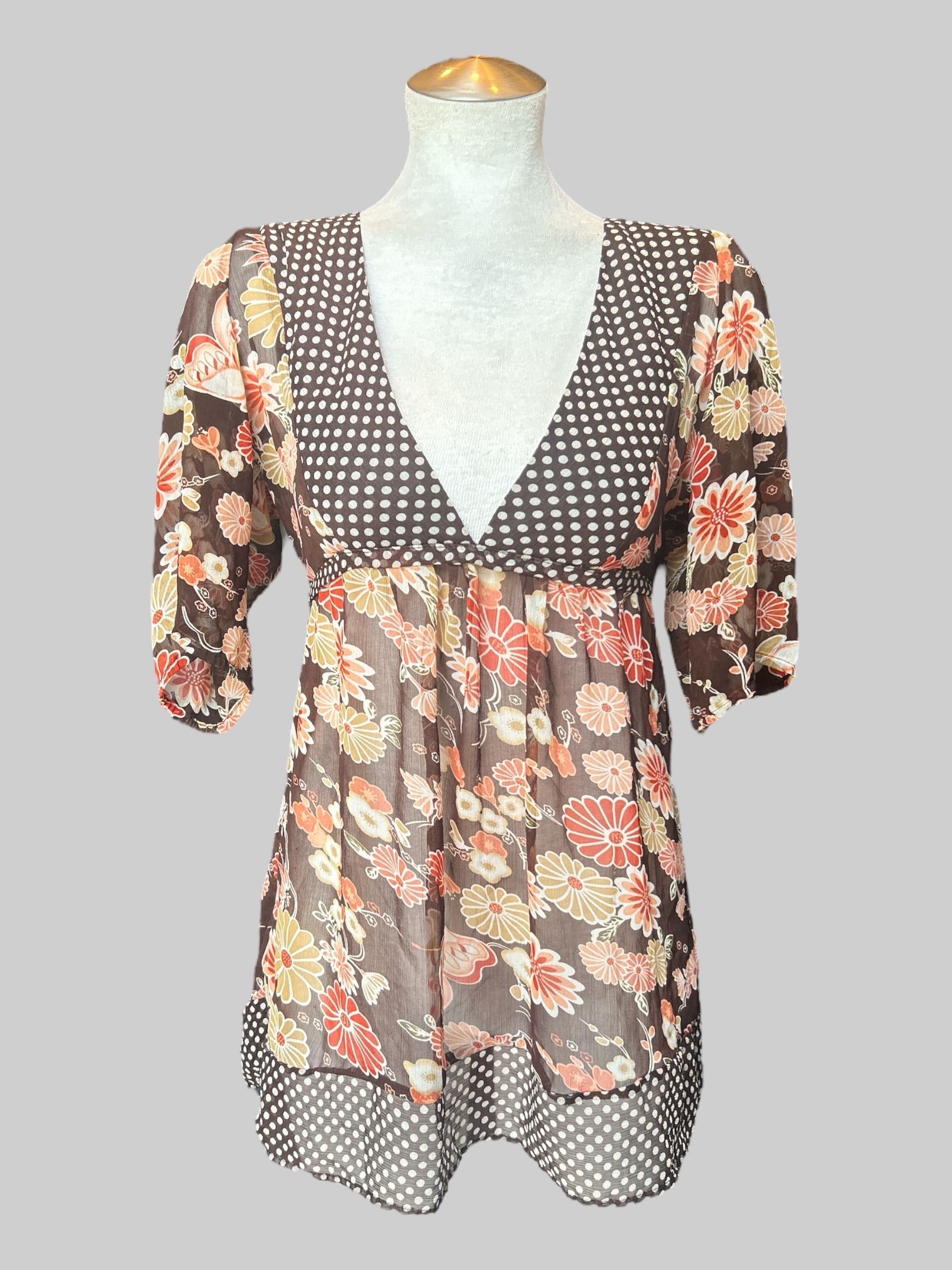 L vintage flowy brown sheer top with florals, polka dots, and tie in back