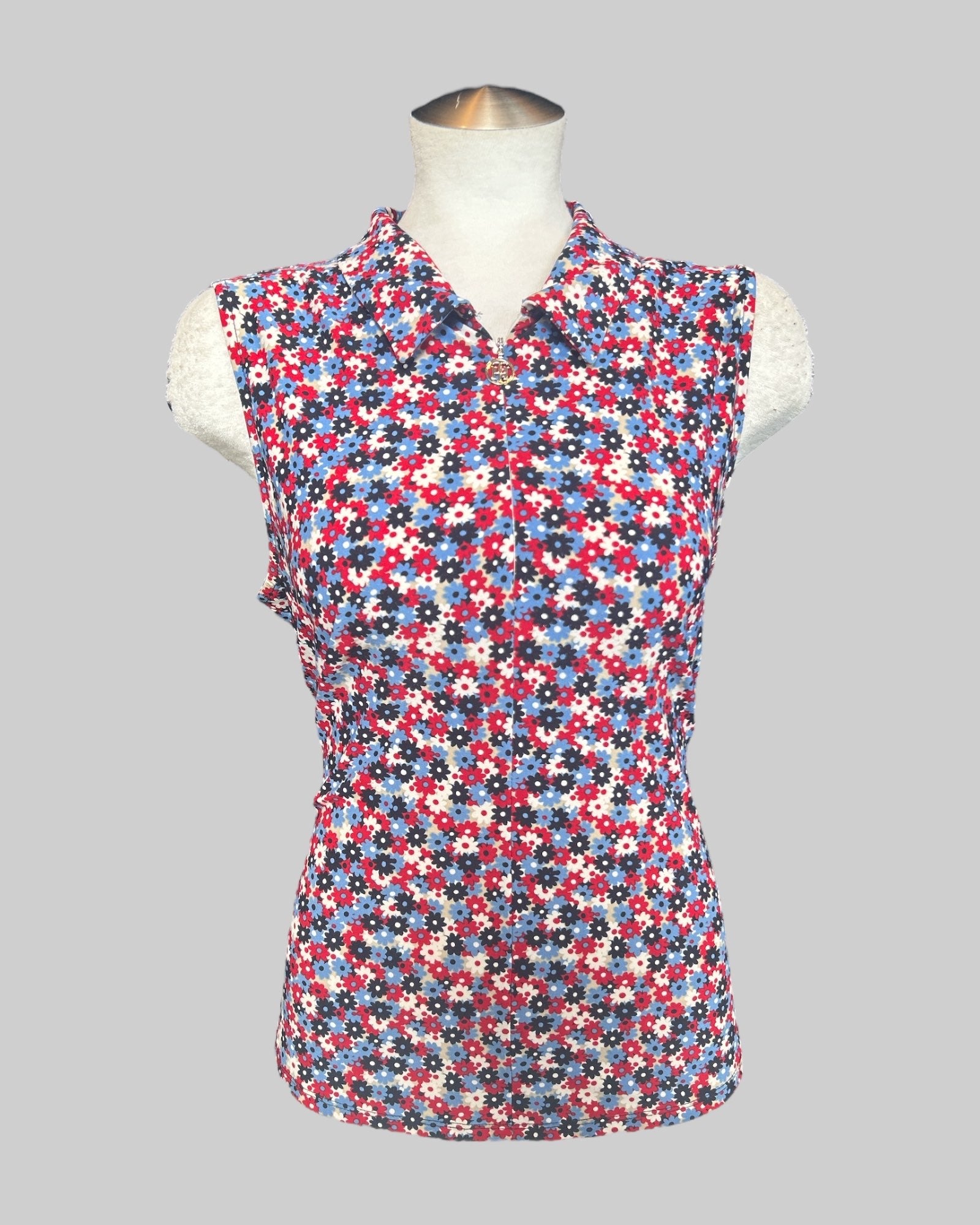XL stretchy and flowy sleeveless top with blue, red, black, and white florals and a quarter zipper