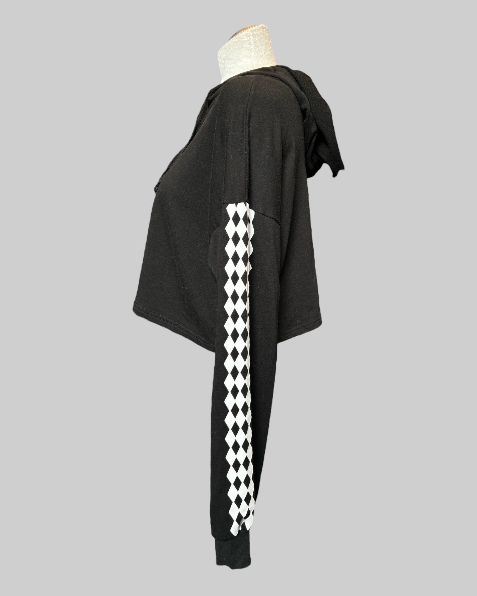 OX black cropped hoodie with black and white checkered sleeves