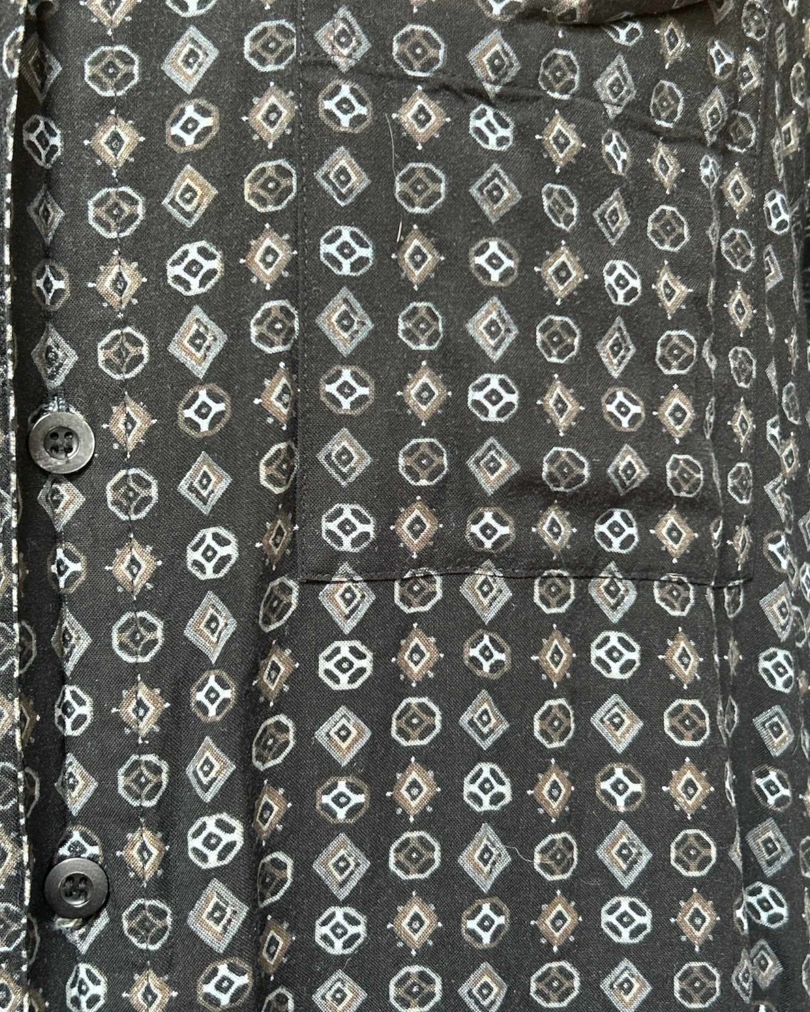 OX  flowy black button up t shirt with geometric pattern and chest pocket