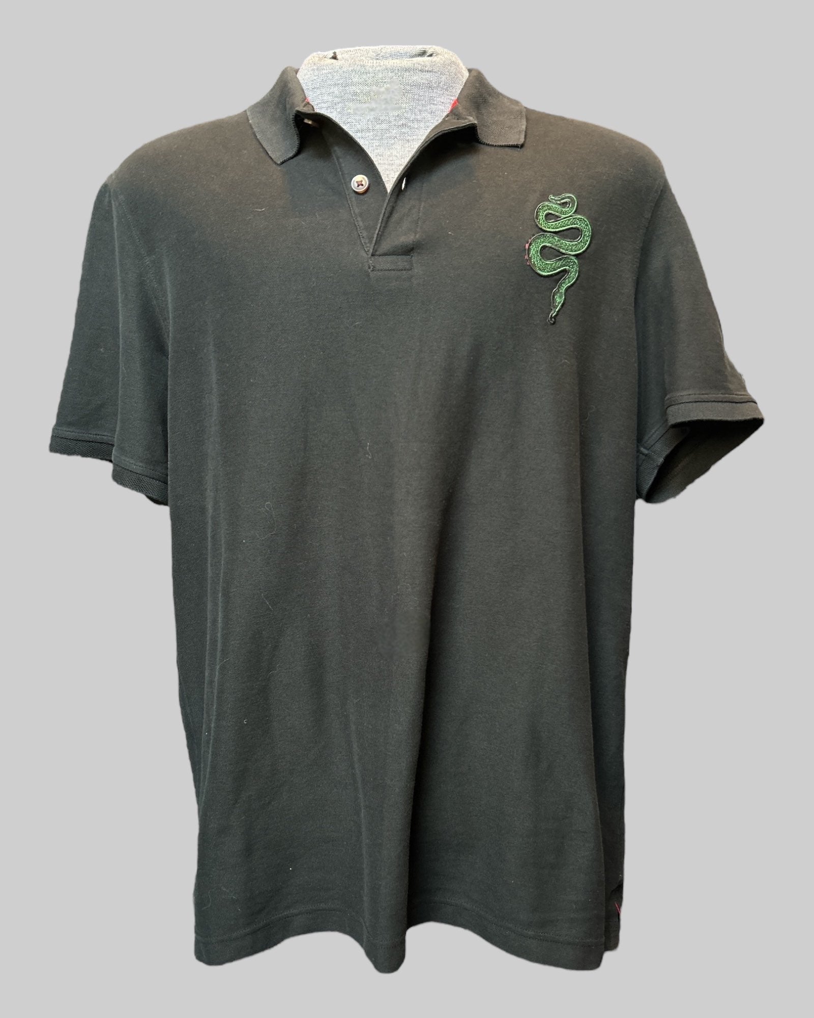 1x black polo with snake patch and hand painted design on back