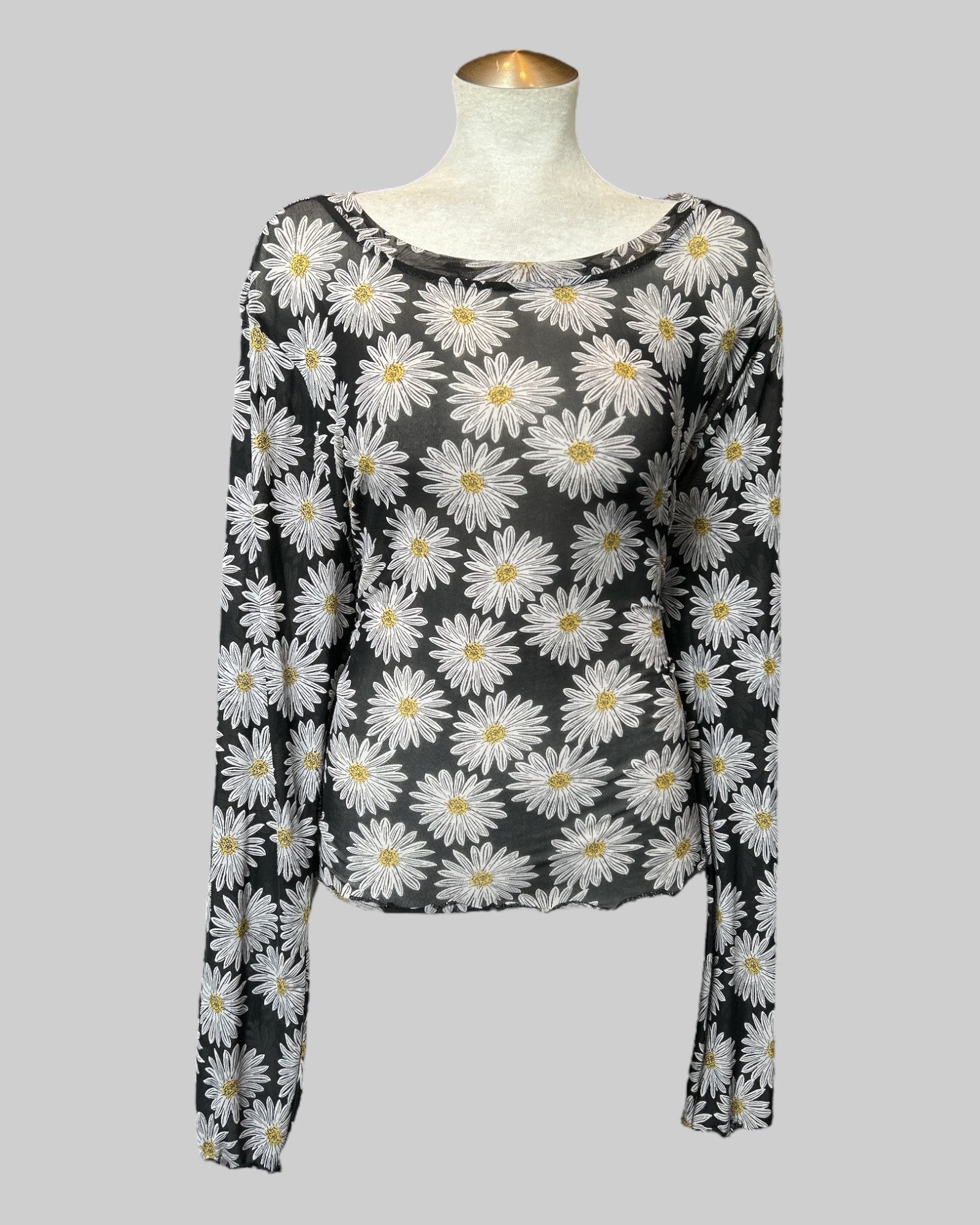 3X sheer black long sleeve top with daisies and lettuce hem