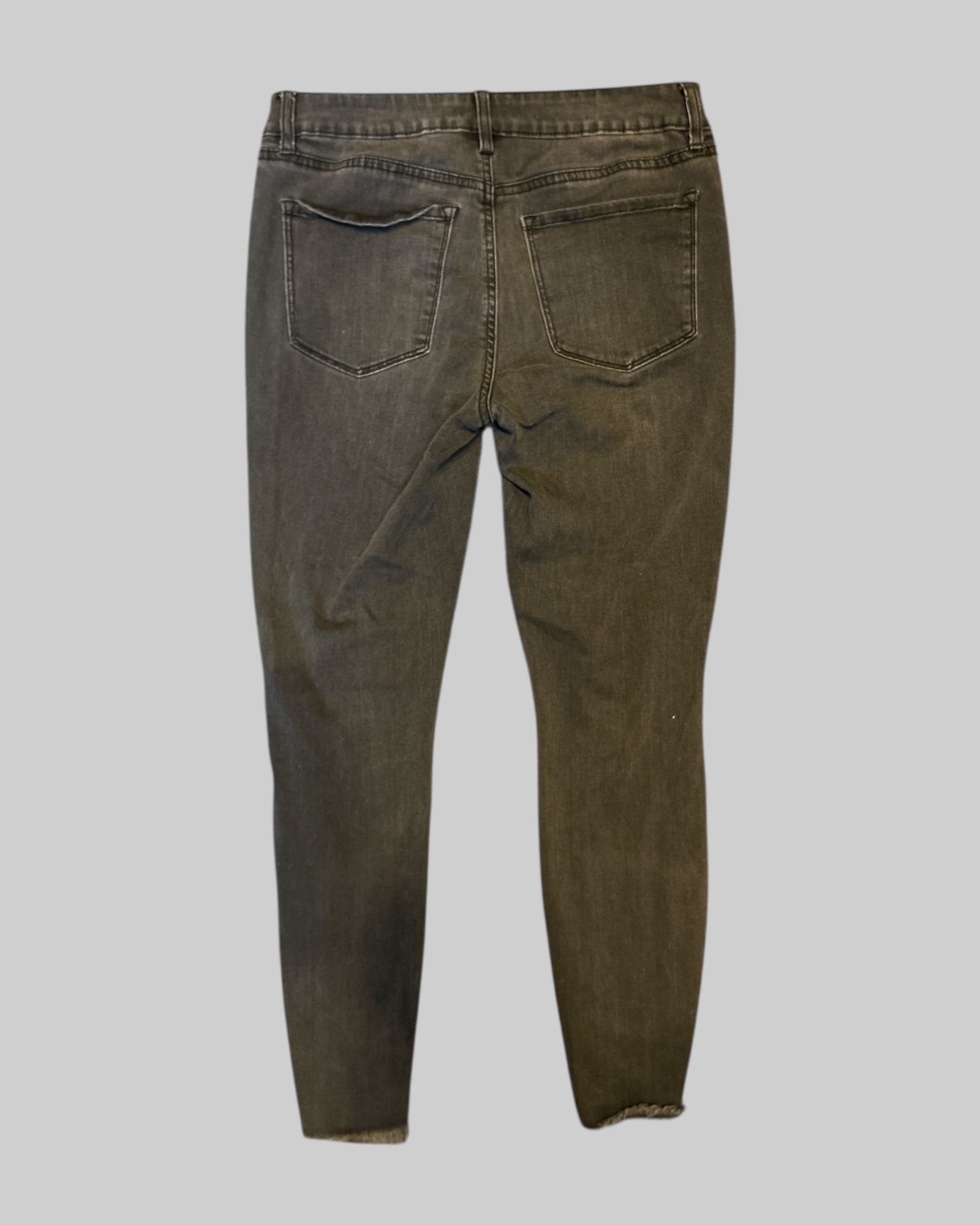 M black stretchy jeans with pockets and distressed knees
