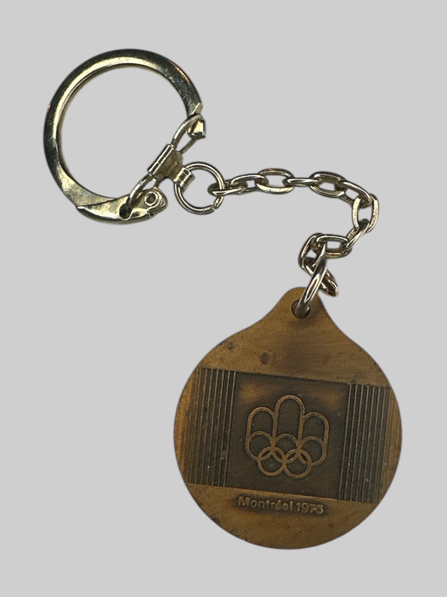 Vintage brass 1976 Montreal Olympics keychain