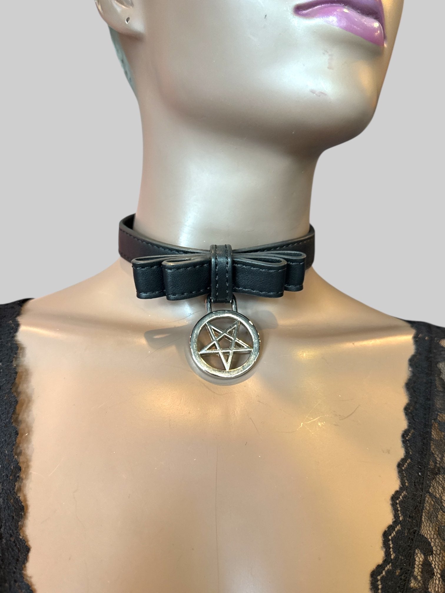 Killstar black leather choker with pentagram bow