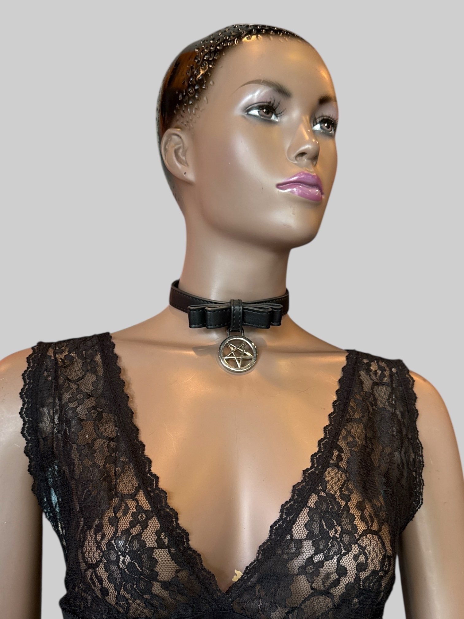 Killstar black leather choker with pentagram bow