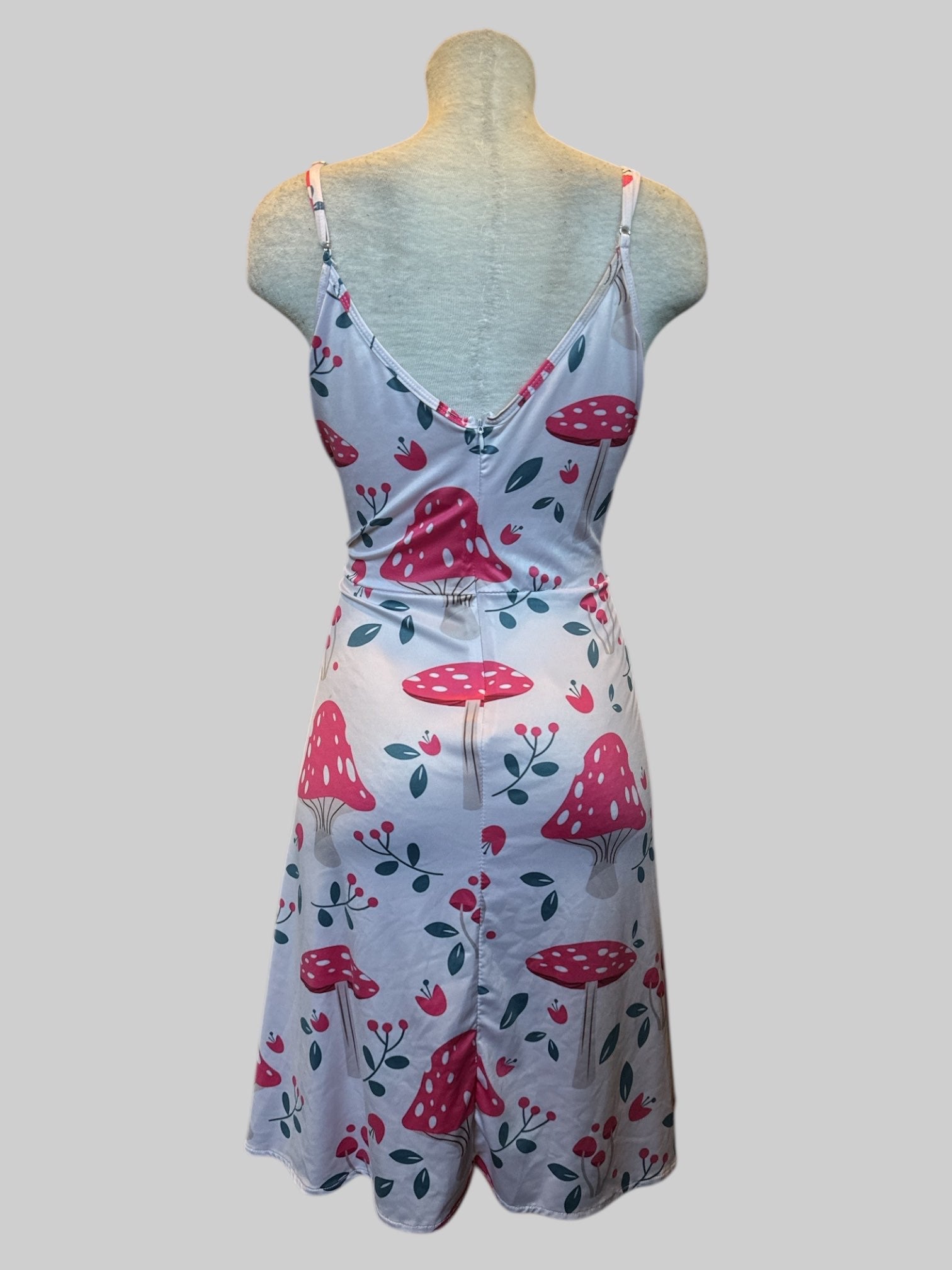 1X fit and flare white dress with mushroom graphics has lots of stretch and back zipper