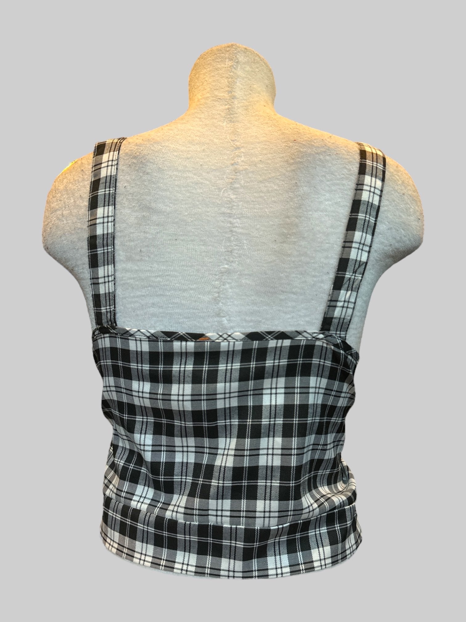 1X black and white plaid crop top with zipper in front