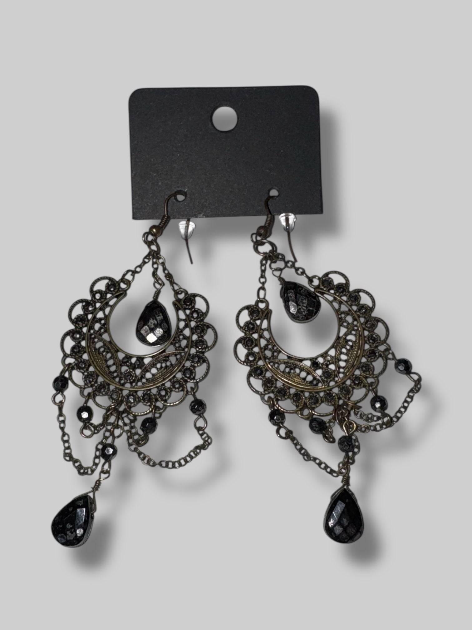 Black gem ornate dangly earrings