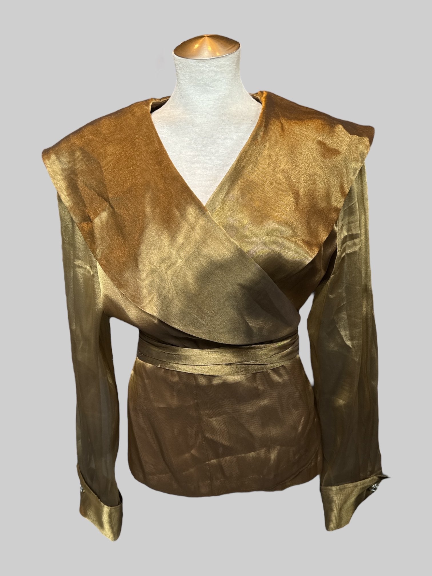 L Greenish brown satin texture wrap top with sheer sleeves and shoulder pads