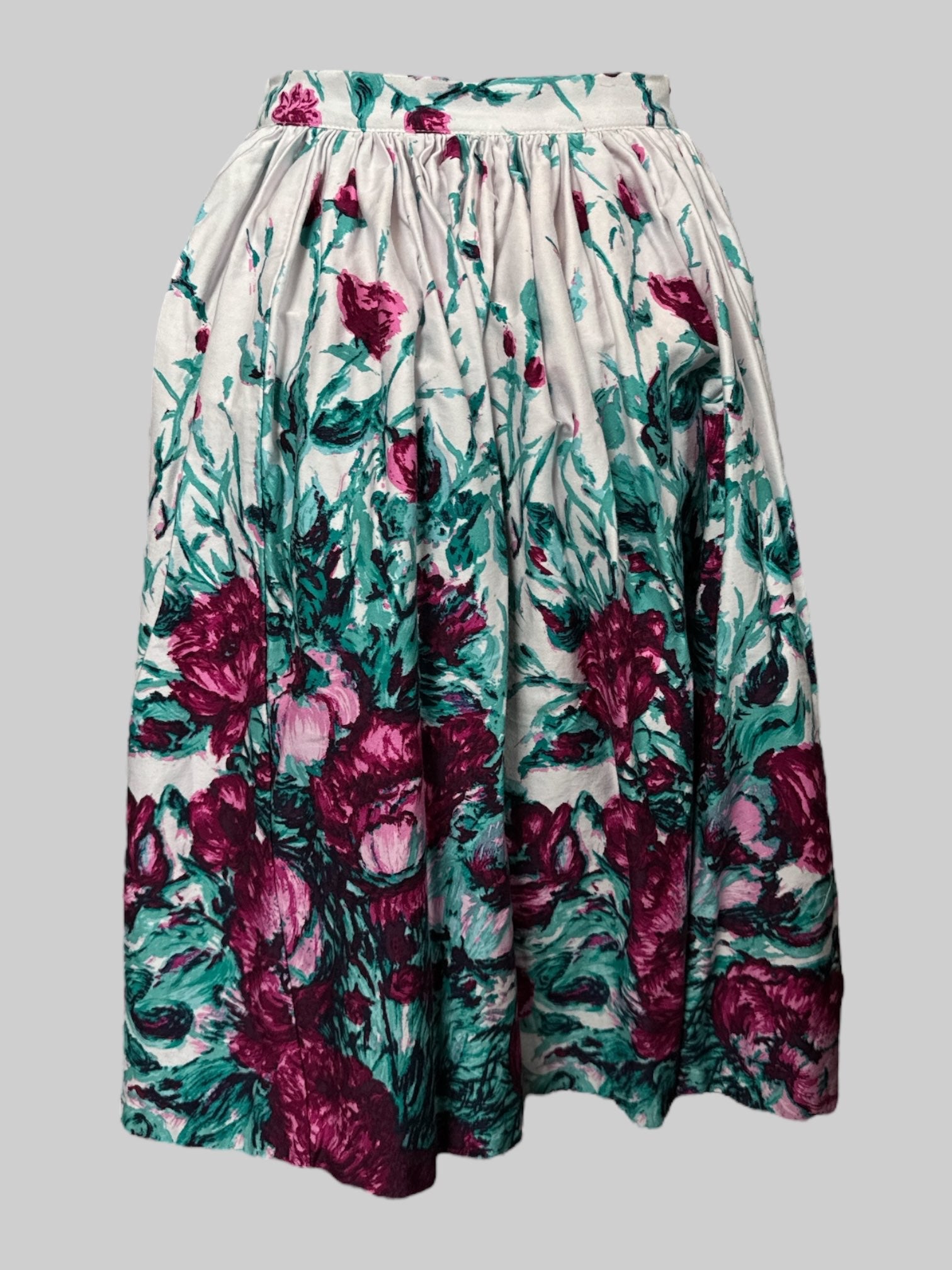 L Pin up white pleated skirt with purple florals and green botanicals
