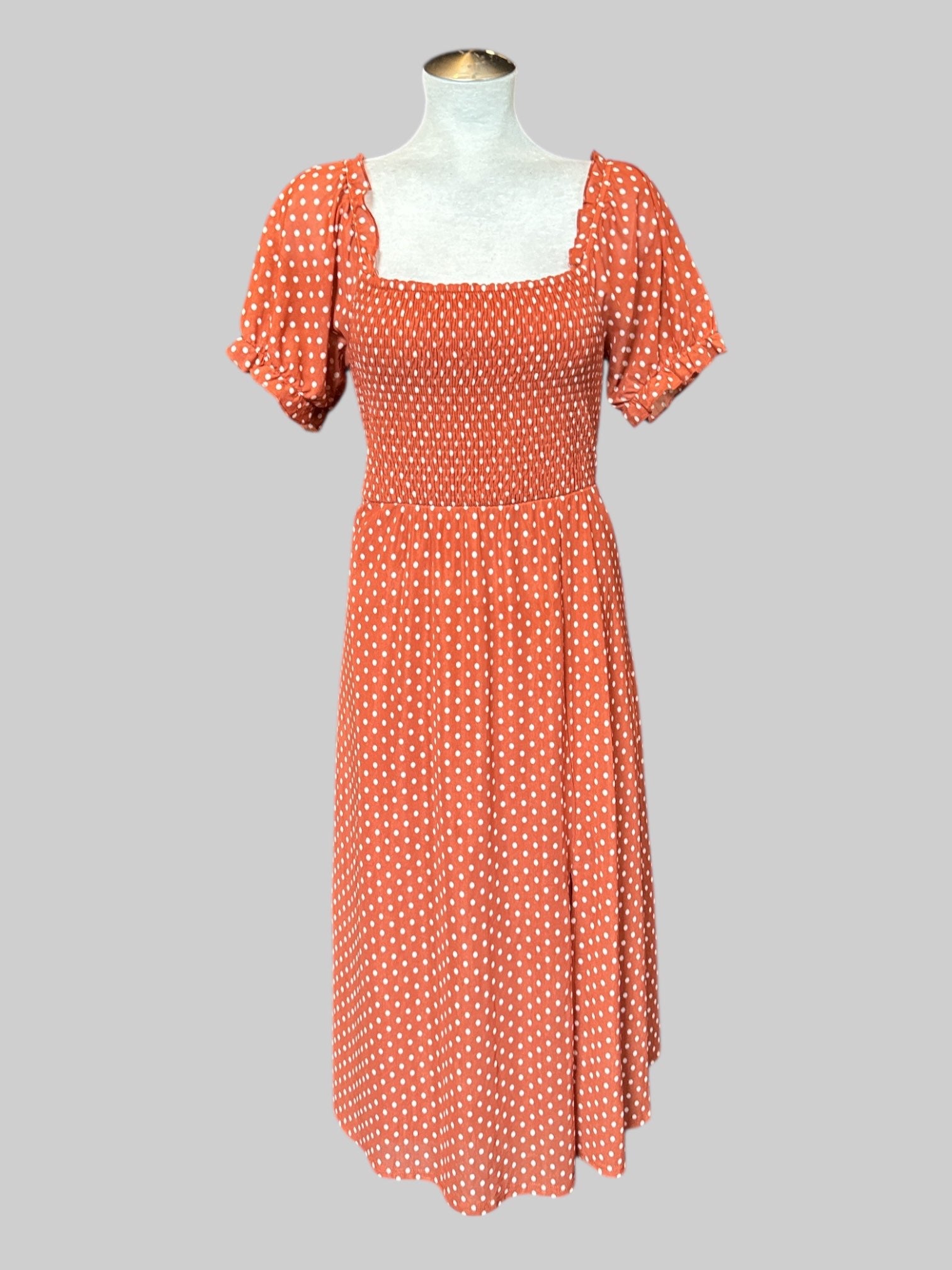 XL Orange stretchy and flowy dress with shirred front and back, white polkadots, and sheer ruffle sleeves