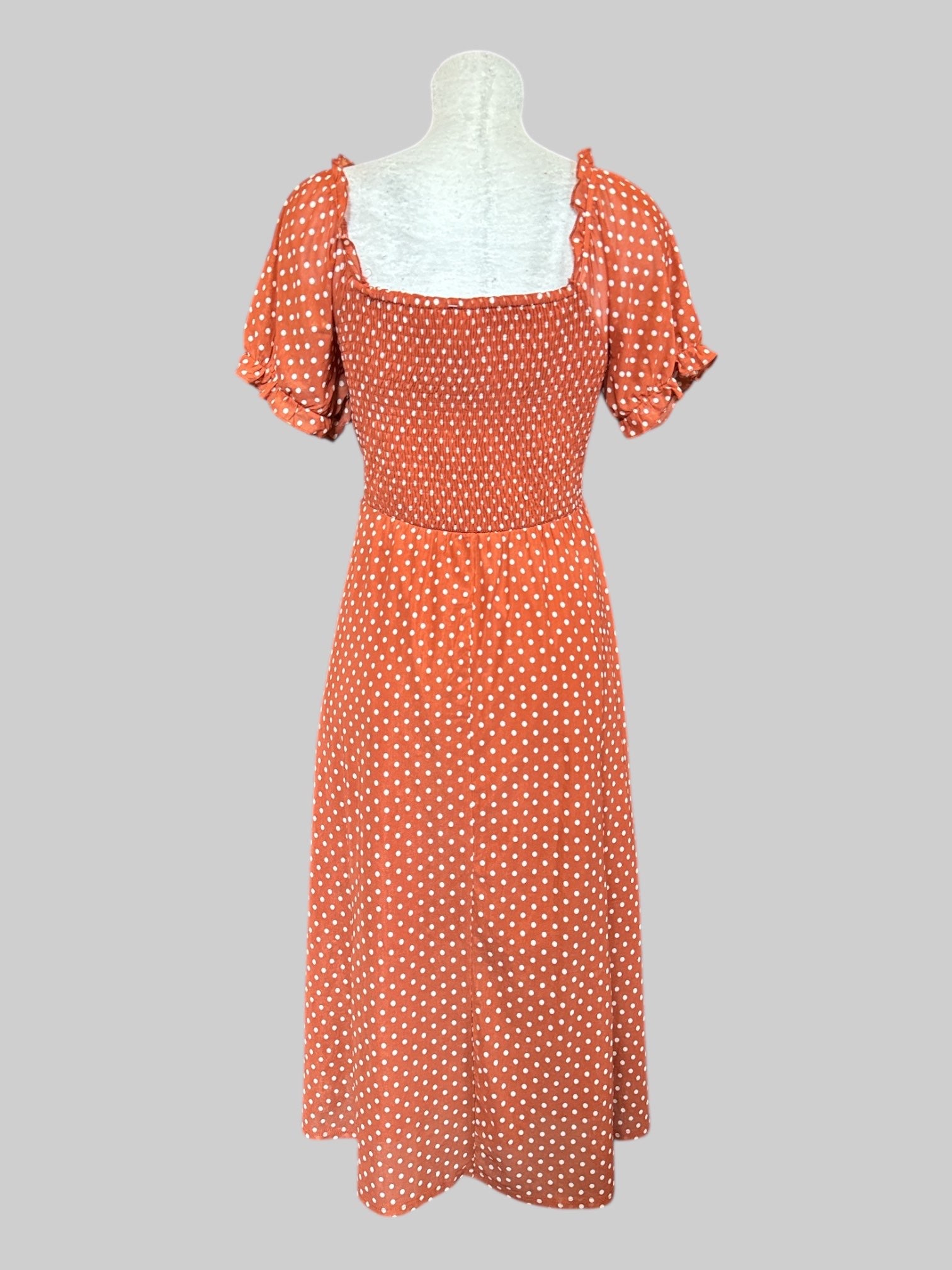 XL Orange stretchy and flowy dress with shirred front and back, white polkadots, and sheer ruffle sleeves
