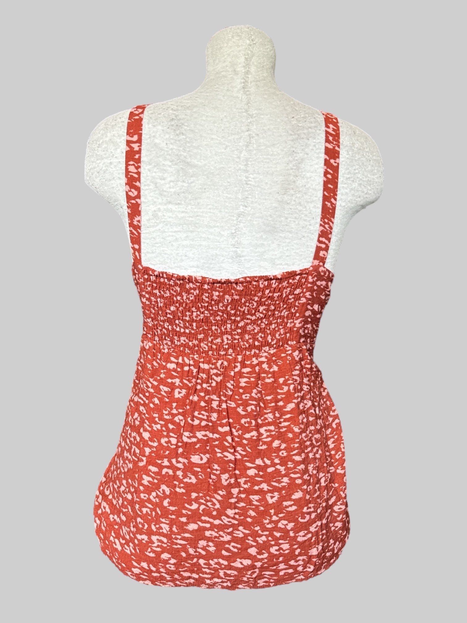0X Brownish orange flowy top with pink animal print pattern and shirred back
