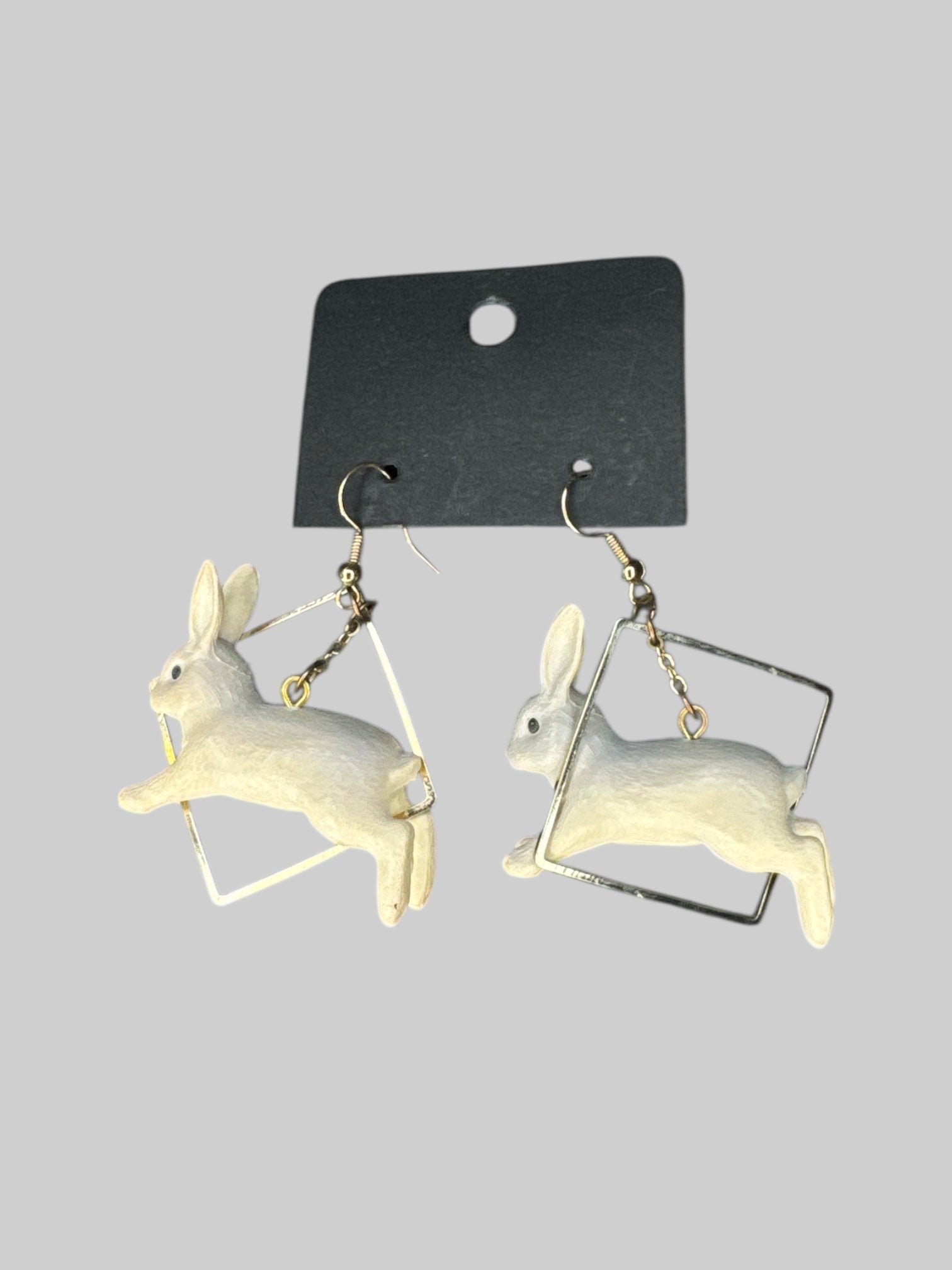 Silvertone geometrical rabbit dangling earrings