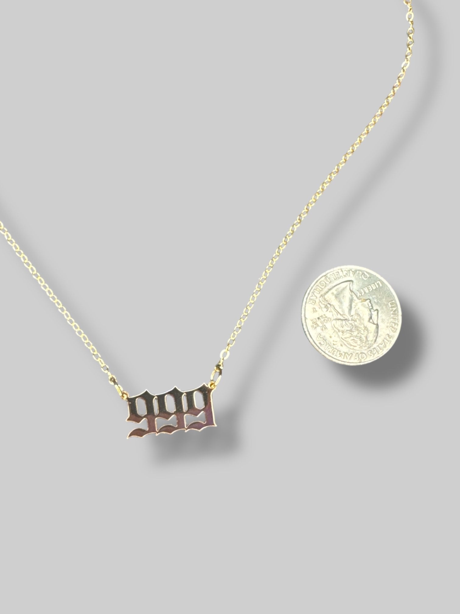 Gold tone 999 angel number necklace