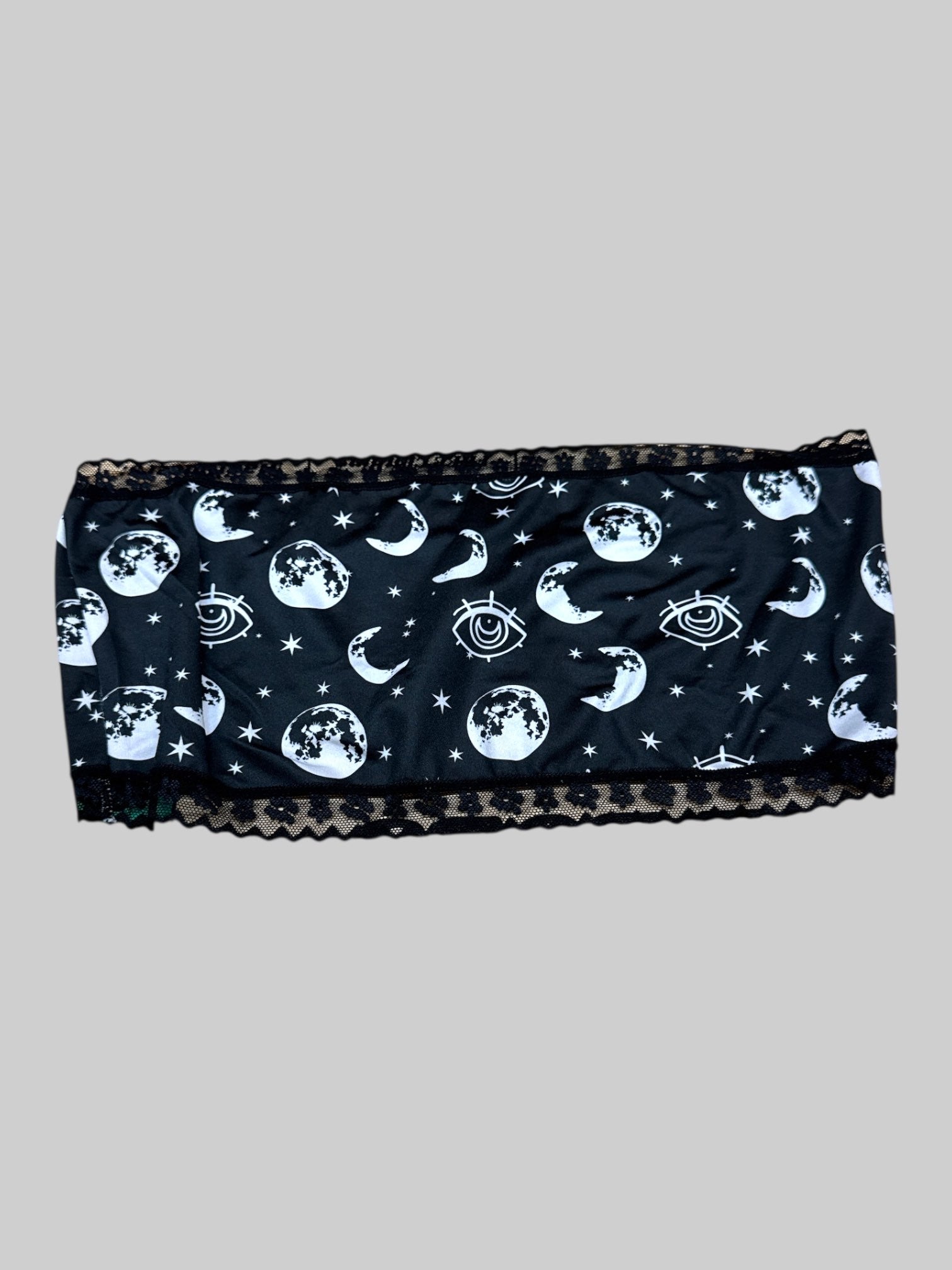 L black strapless top with celestial designs