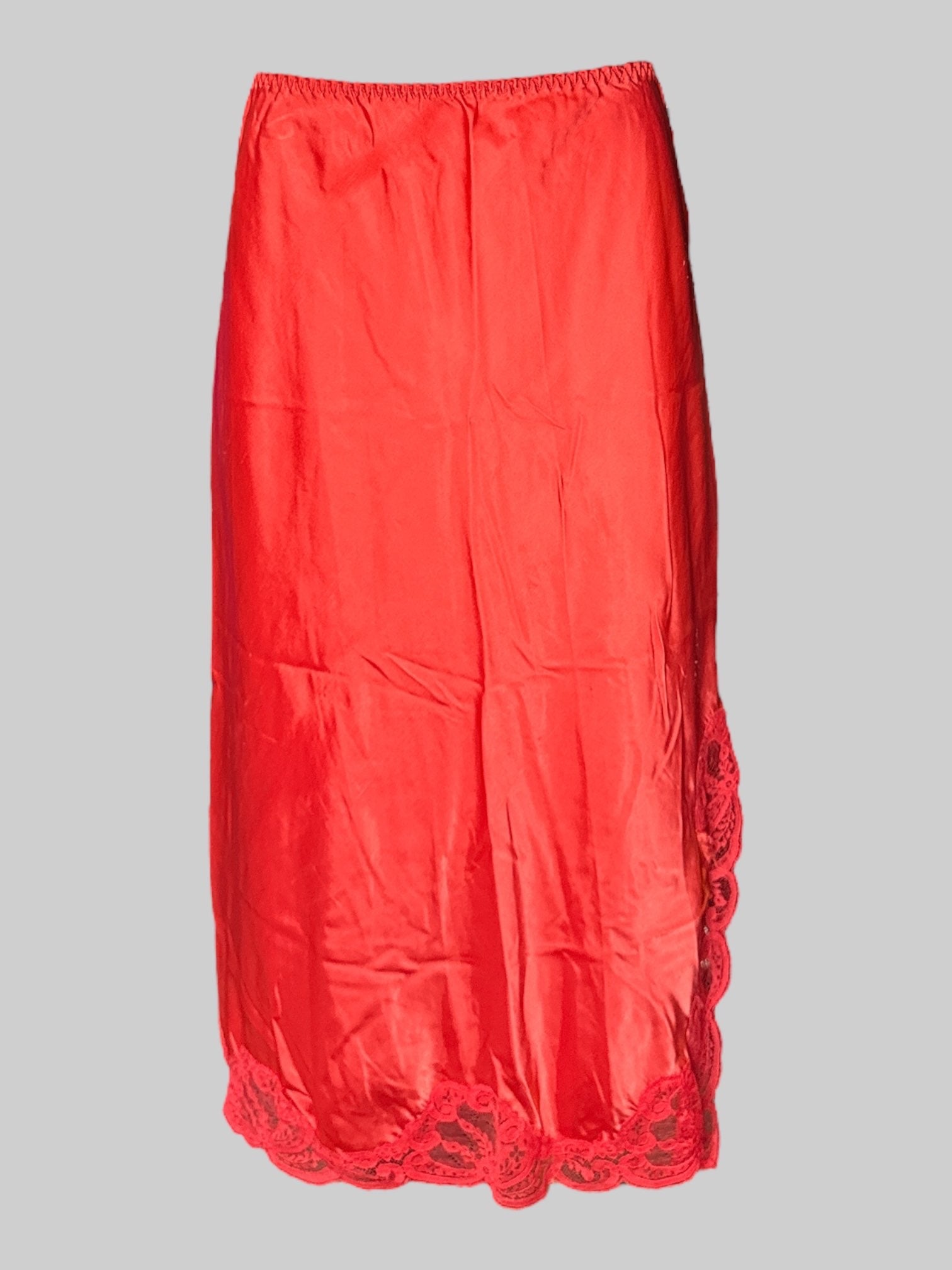 L Vintage reddish orange slip skirt with leg slit and lace trim