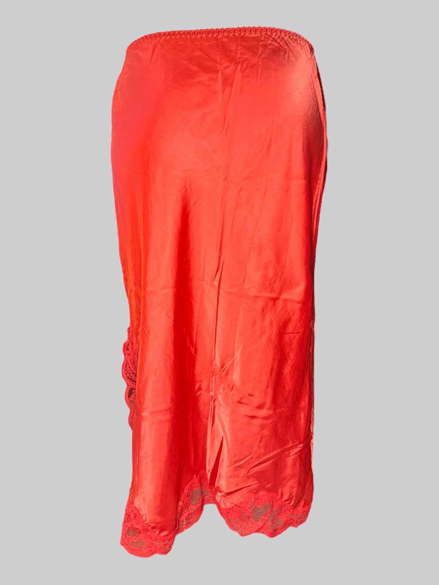 L Vintage reddish orange slip skirt with leg slit and lace trim