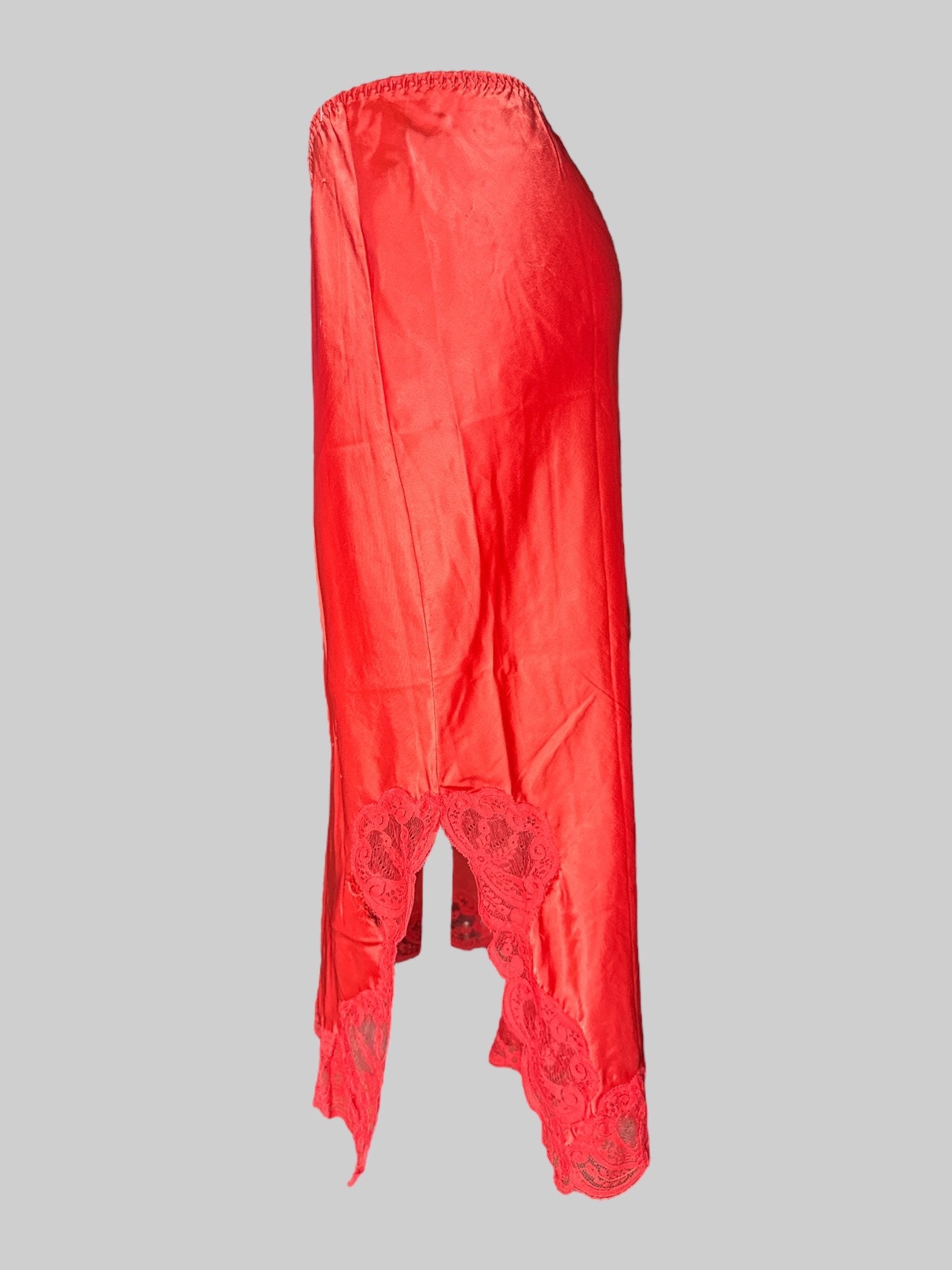 L Vintage reddish orange slip skirt with leg slit and lace trim